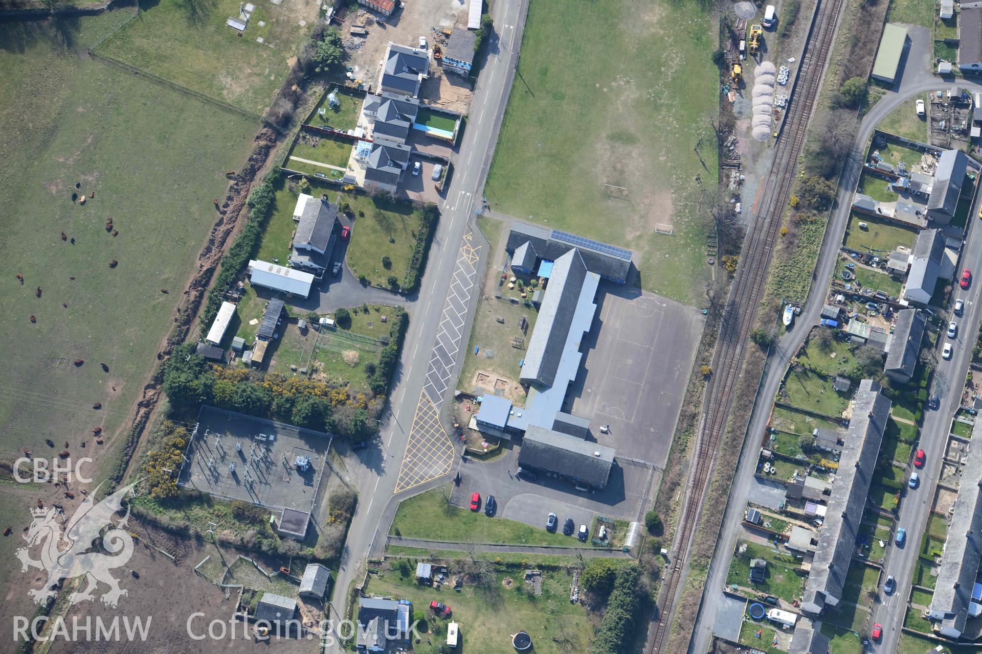 School, lower Harlech. Oblique aerial photograph taken during the Royal Commission’s programme of archaeological aerial reconnaissance by Toby Driver on 25 March 2022.