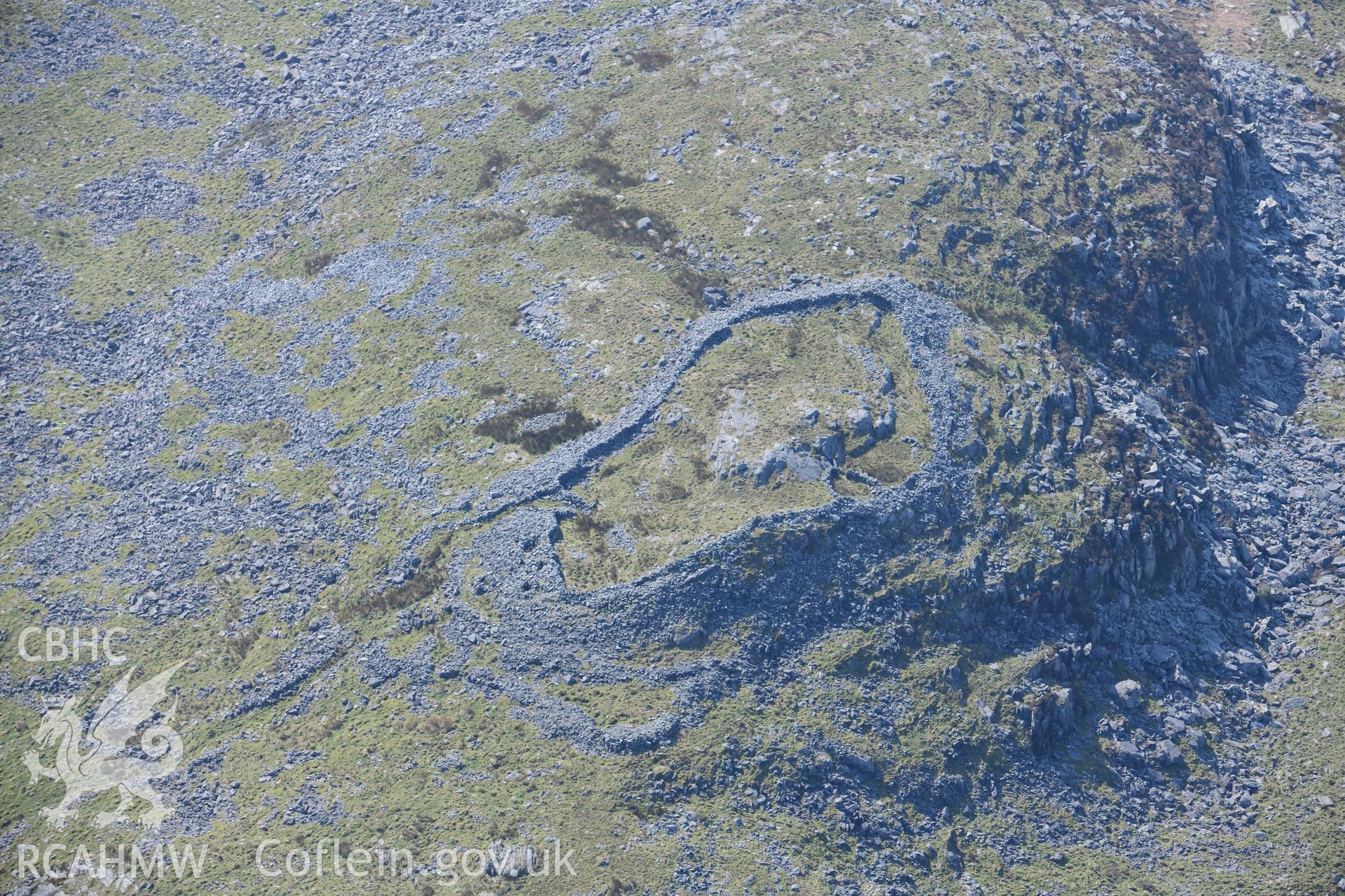 Craig y Dinas Hillfort. Oblique aerial photographs taken during the Royal Commission’s programme of archaeological aerial reconnaissance by Toby Driver on 25 March 2022.