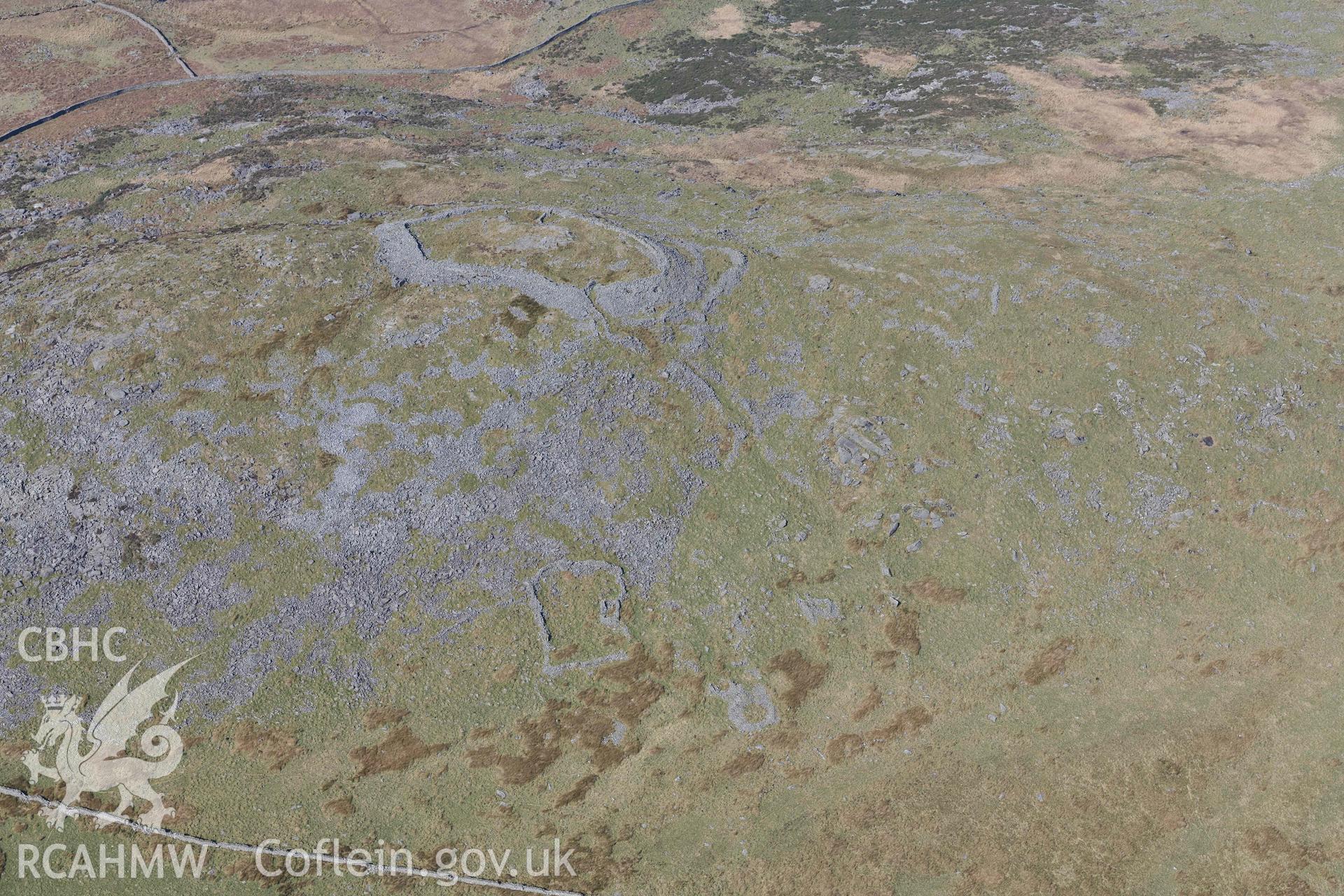 Craig y Dinas Hillfort. Oblique aerial photographs taken during the Royal Commission’s programme of archaeological aerial reconnaissance by Toby Driver on 25 March 2022.