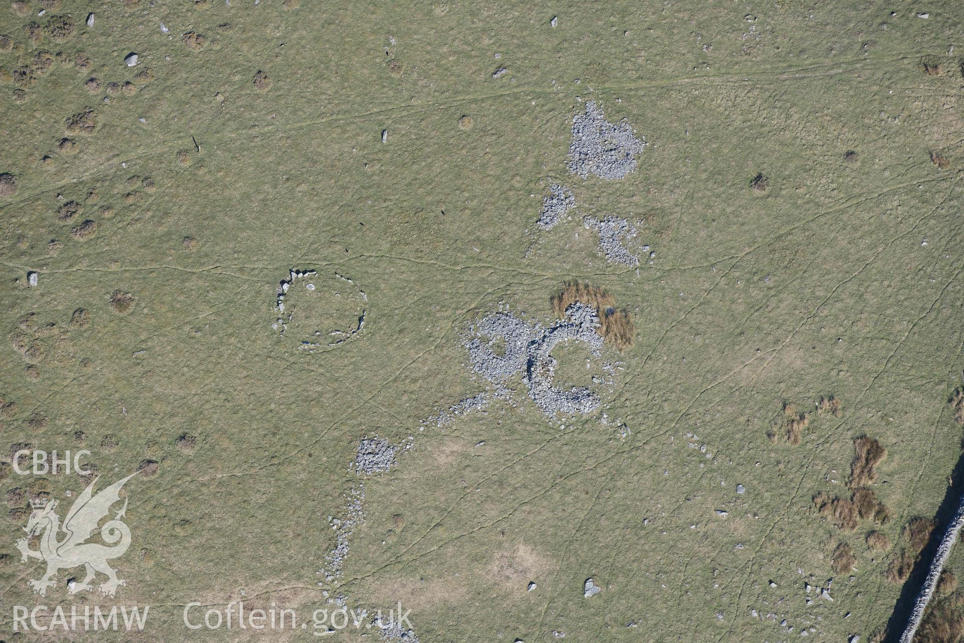 Mynydd Egryn hut circle settlement and Hengwm cairn circle. Oblique aerial photographs taken during the Royal Commission’s programme of archaeological aerial reconnaissance by Toby Driver on 25 March 2022.