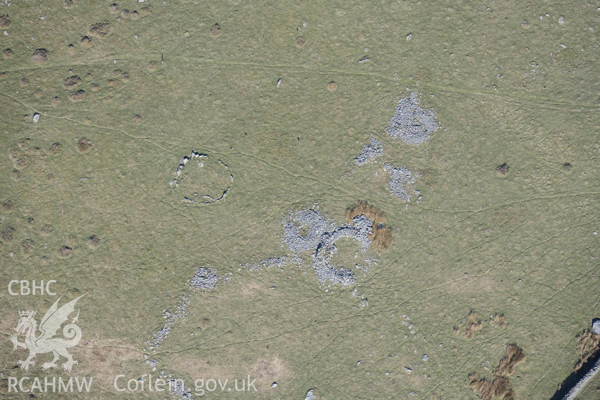 Mynydd Egryn hut circle settlement and Hengwm cairn circle. Oblique aerial photographs taken during the Royal Commission’s programme of archaeological aerial reconnaissance by Toby Driver on 25 March 2022.