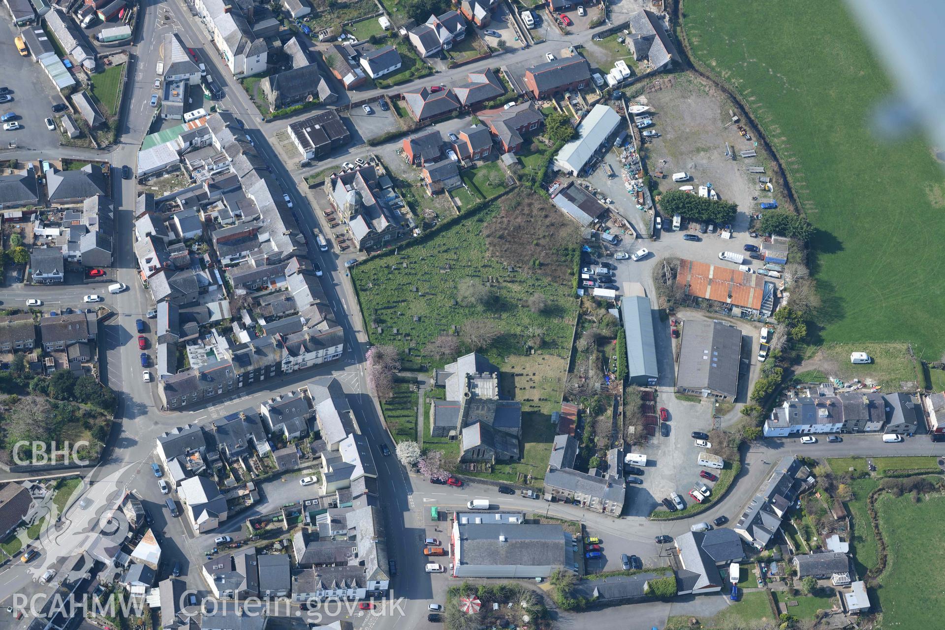 St Cadfan's Church, Tywyn. Oblique aerial photograph taken during the Royal Commission’s programme of archaeological aerial reconnaissance by Toby Driver on 25 March 2022.