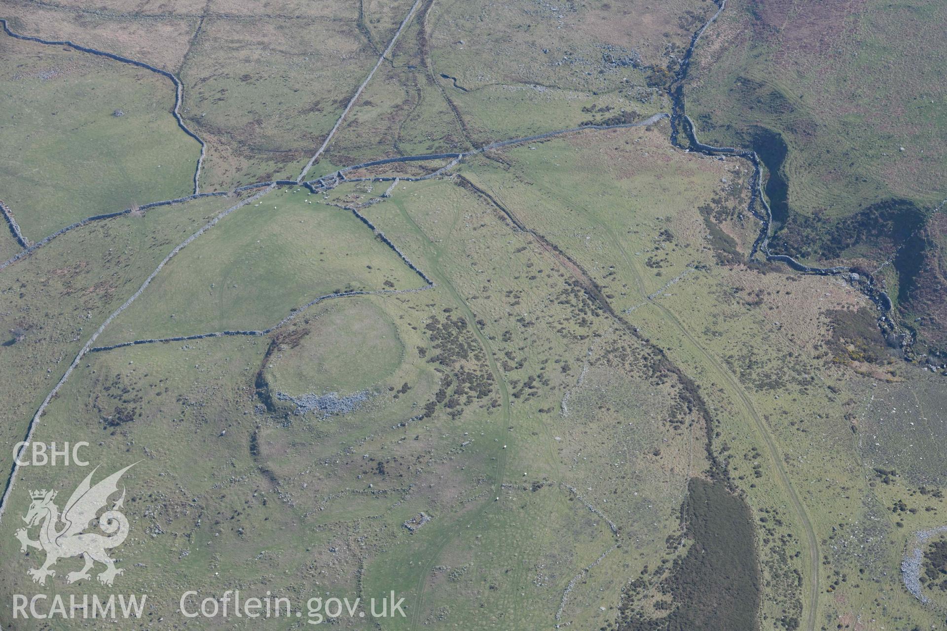 Pen y Dinas Hillfort. Oblique aerial photographs taken during the Royal Commission’s programme of archaeological aerial reconnaissance by Toby Driver on 25 March 2022.