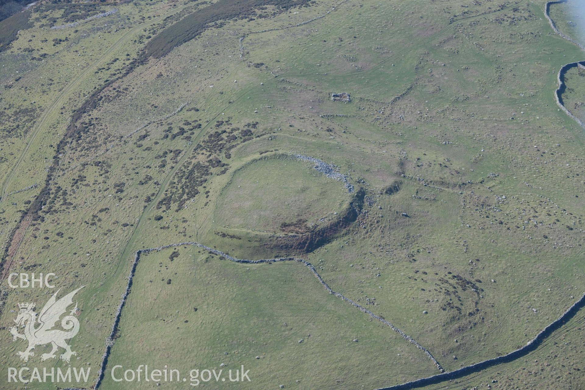 Pen y Dinas Hillfort. Oblique aerial photographs taken during the Royal Commission’s programme of archaeological aerial reconnaissance by Toby Driver on 25 March 2022.