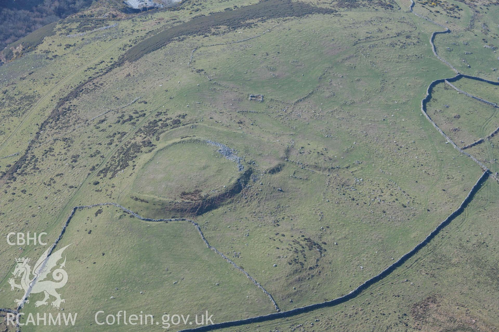 Pen y Dinas Hillfort. Oblique aerial photographs taken during the Royal Commission’s programme of archaeological aerial reconnaissance by Toby Driver on 25 March 2022.