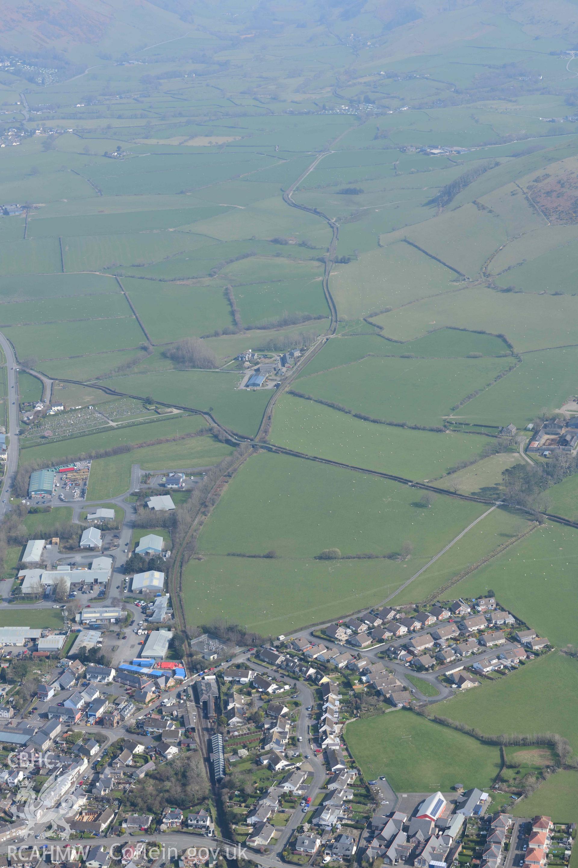 Tywyn, Pendre Station, Talyllyn Railway, landscape view looking north-east. Oblique aerial photographs taken during the Royal Commission’s programme of archaeological aerial reconnaissance by Toby Driver on 25 March 2022.