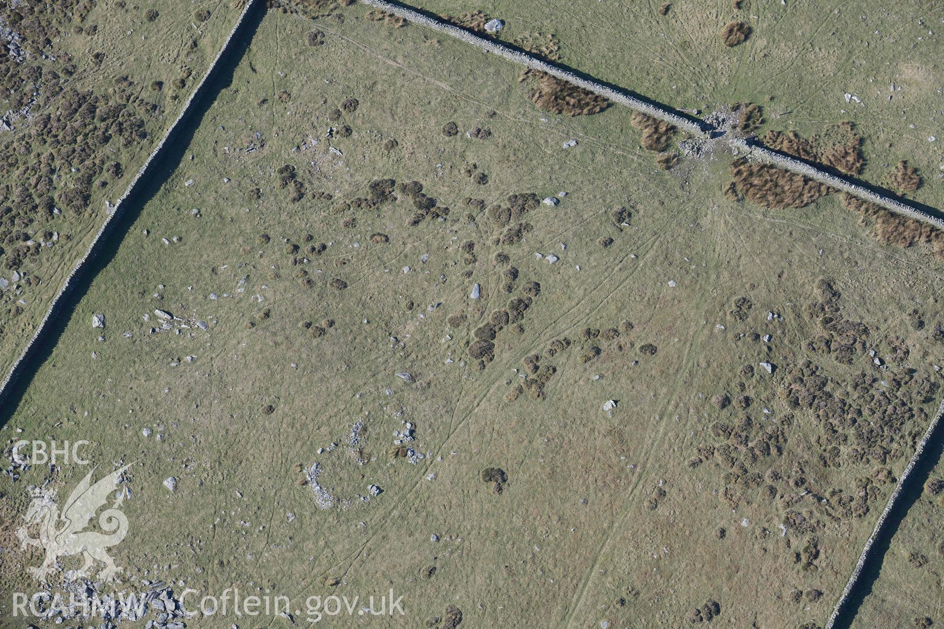 Hengwm settlement enclosure. Oblique aerial photograph taken during the Royal Commission’s programme of archaeological aerial reconnaissance by Toby Driver on 25 March 2022.