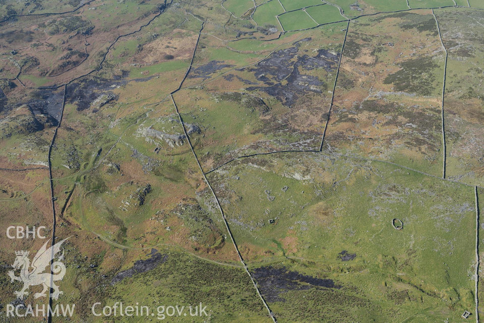 Castell Llanaber or Ffrodd Fechan Fort, wide view from the north east. Oblique aerial photographs taken during the Royal Commission’s programme of archaeological aerial reconnaissance by Toby Driver on 25 March 2022.