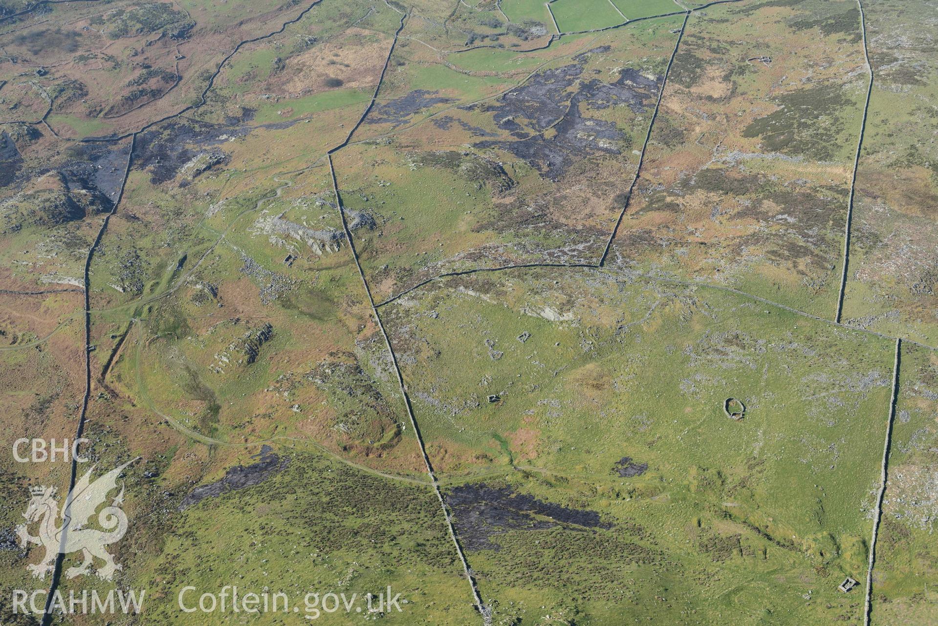 Castell Llanaber or Ffrodd Fechan Fort, wide view from the north east. Oblique aerial photographs taken during the Royal Commission’s programme of archaeological aerial reconnaissance by Toby Driver on 25 March 2022.