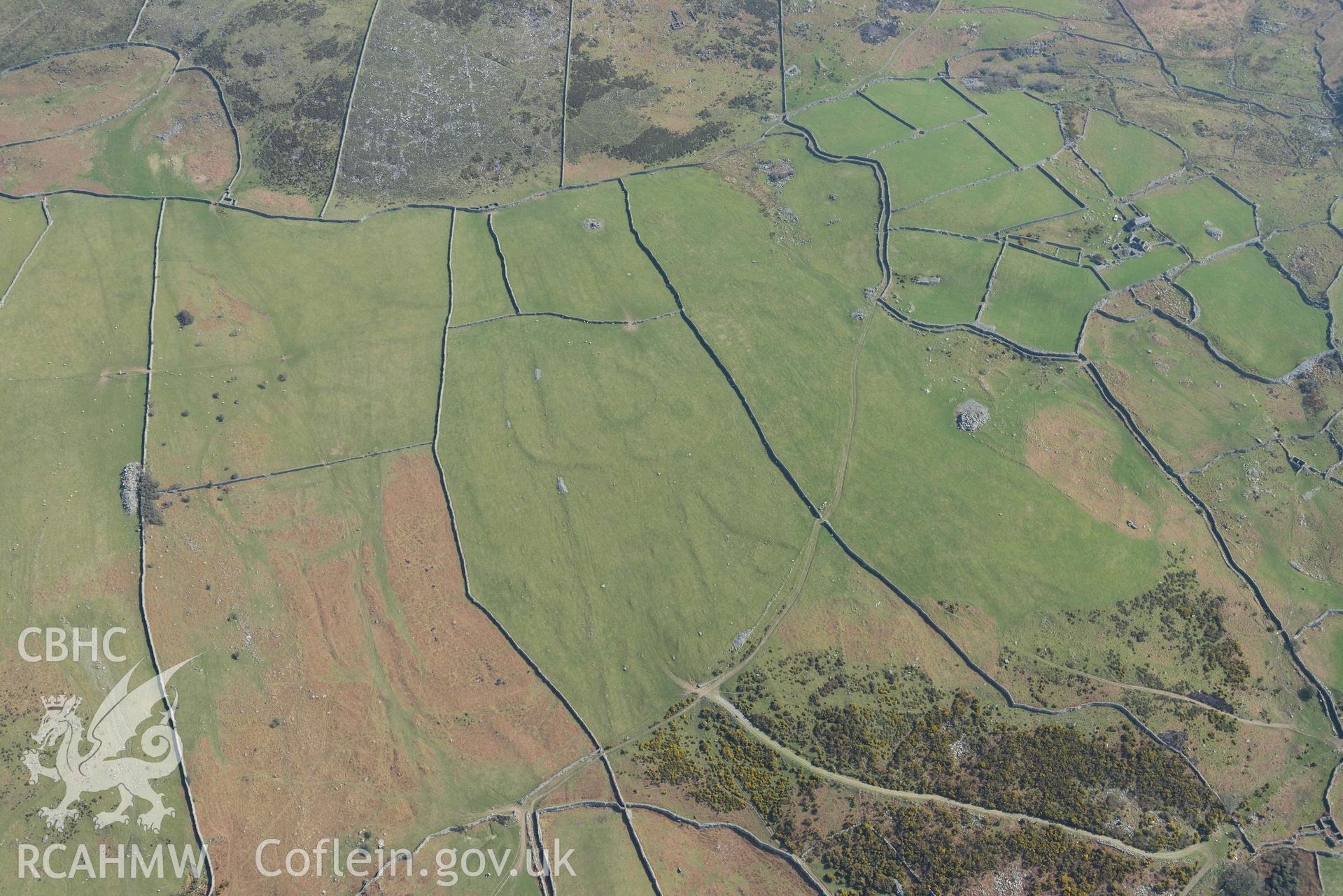 Hendre Coed Uchaf concentric circles. Oblique aerial photographs taken during the Royal Commission’s programme of archaeological aerial reconnaissance by Toby Driver on 25 March 2022.