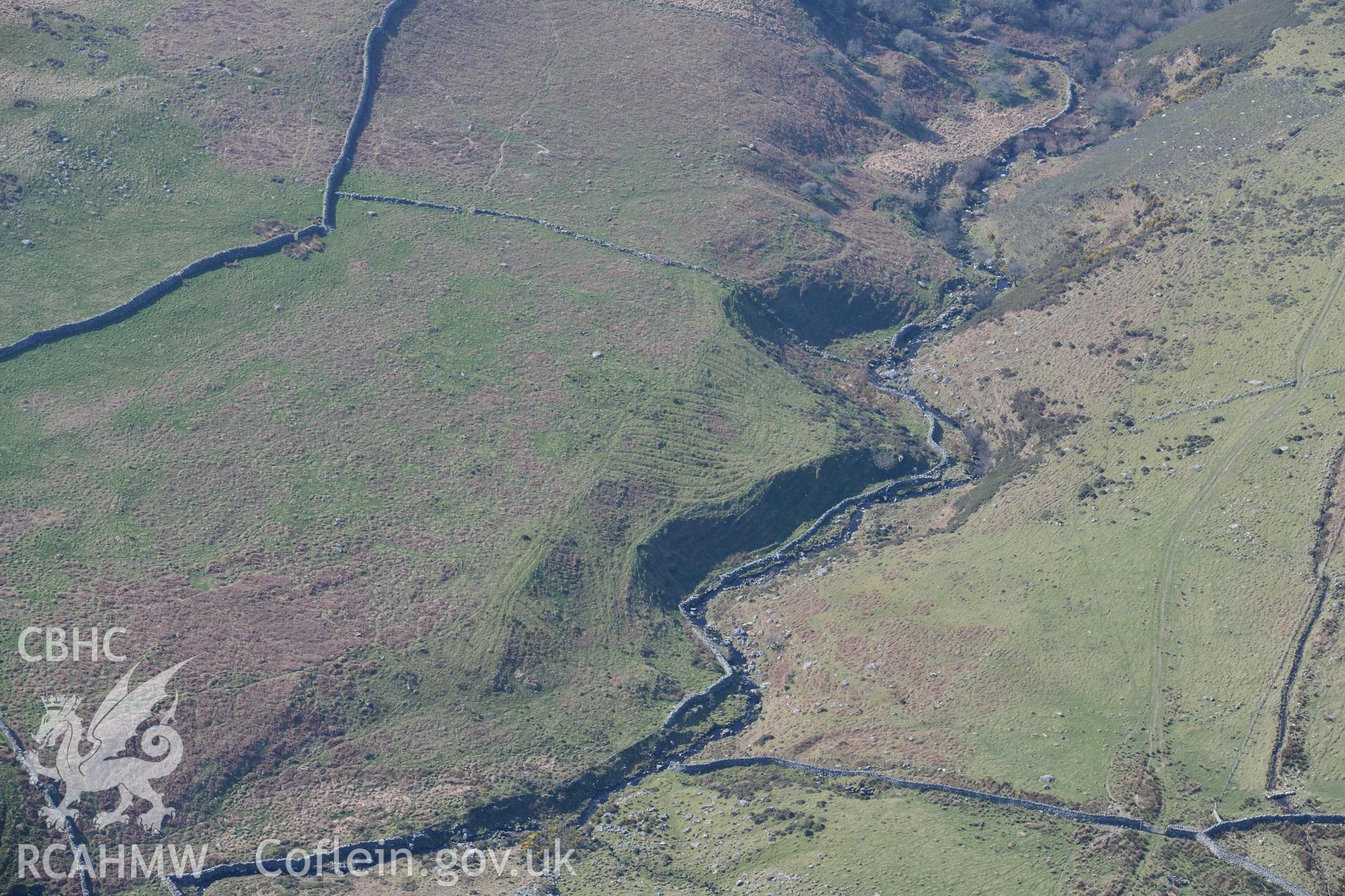 Ceunant Egryn cultivation and settlement. Oblique aerial photograph taken during the Royal Commission’s programme of archaeological aerial reconnaissance by Toby Driver on 25 March 2022.