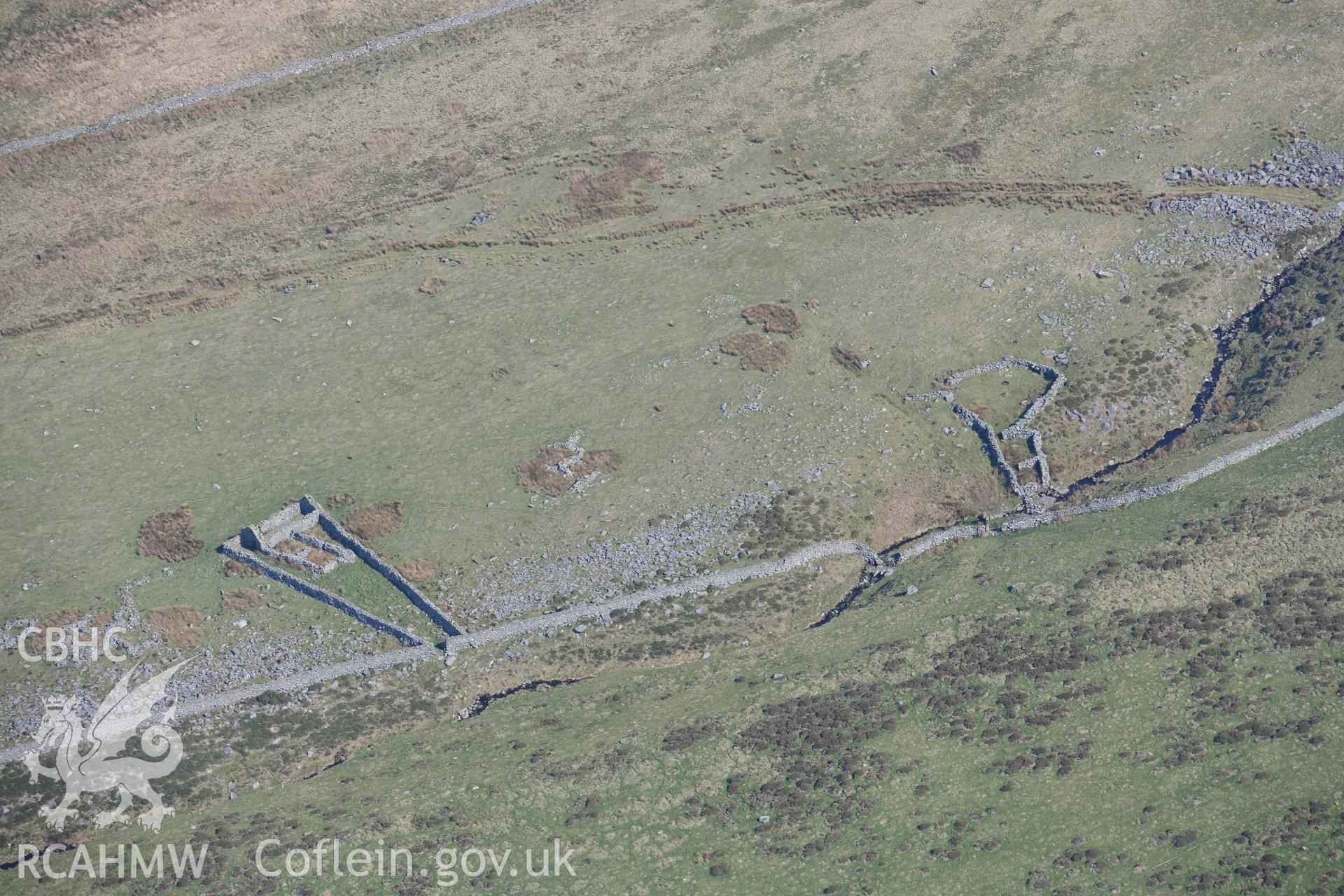 Ceunant Egryn enclosures and settlement. Oblique aerial photographs taken during the Royal Commission’s programme of archaeological aerial reconnaissance by Toby Driver on 25 March 2022.