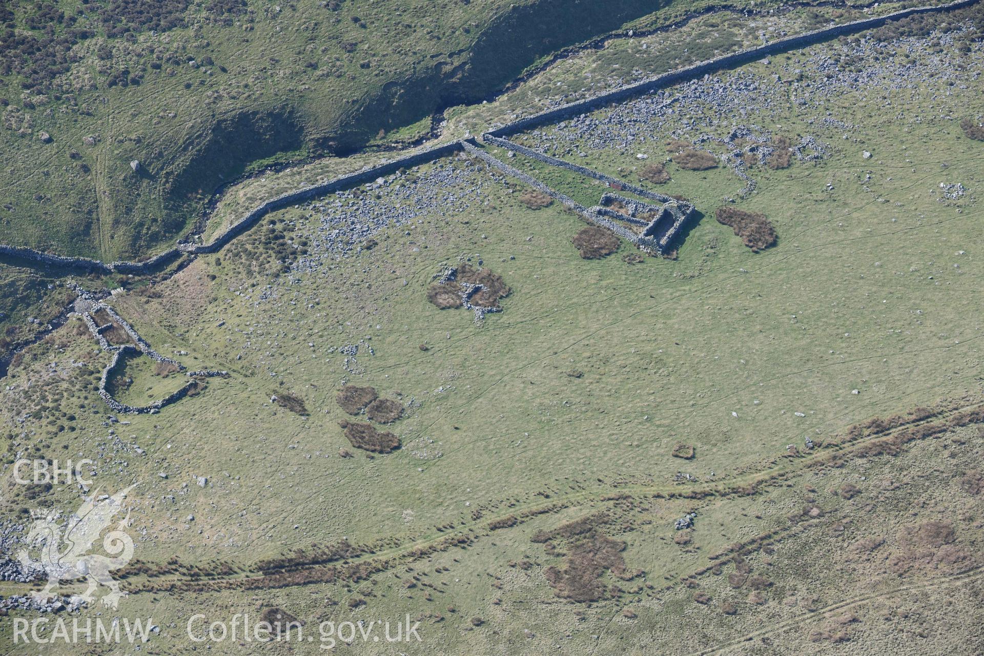 Ceunant Egryn enclosures and settlement. Oblique aerial photographs taken during the Royal Commission’s programme of archaeological aerial reconnaissance by Toby Driver on 25 March 2022.