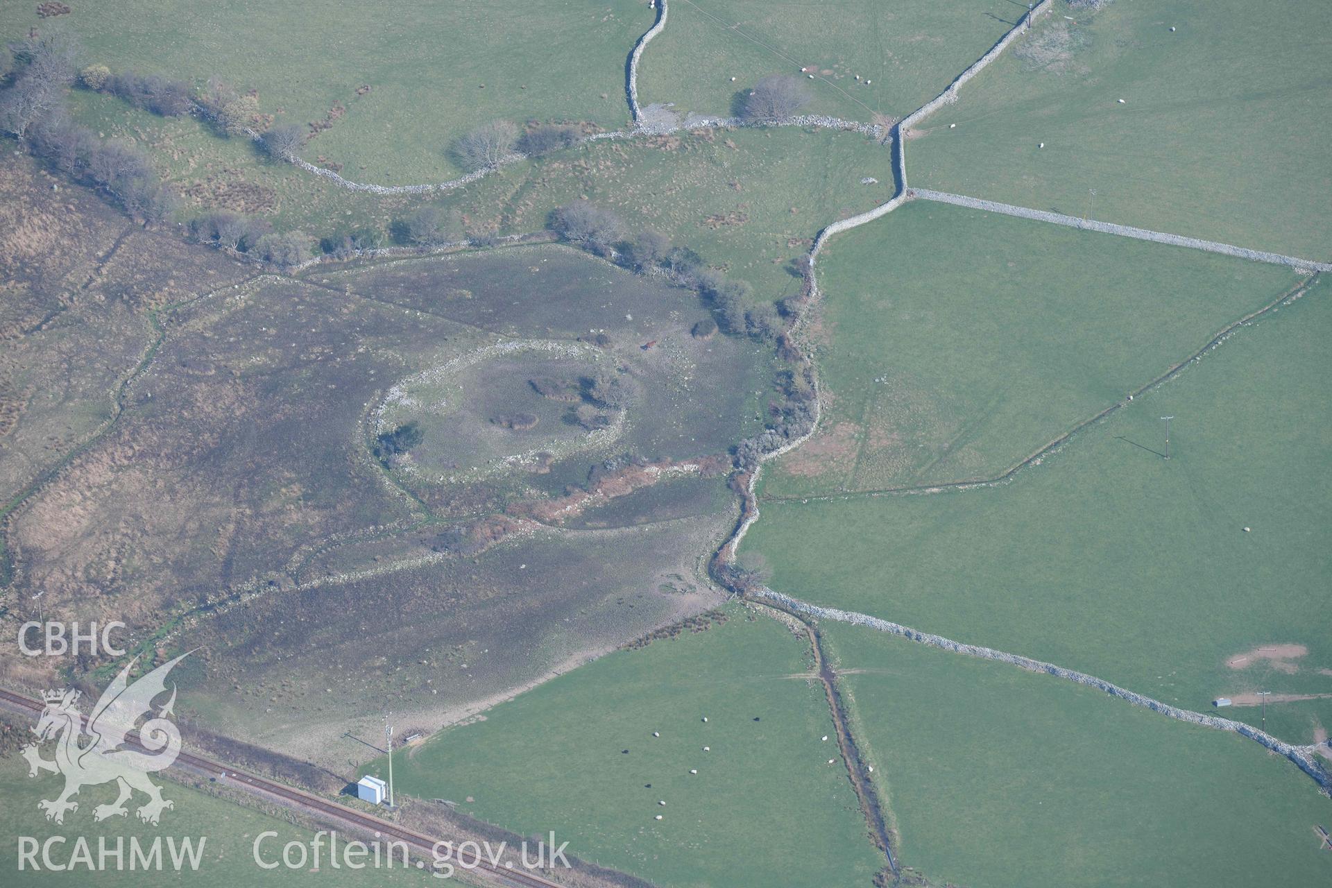 Sebonig/Tyddyn Mawr homestead enclosure. Oblique aerial photographs taken during the Royal Commission’s programme of archaeological aerial reconnaissance by Toby Driver on 25 March 2022.