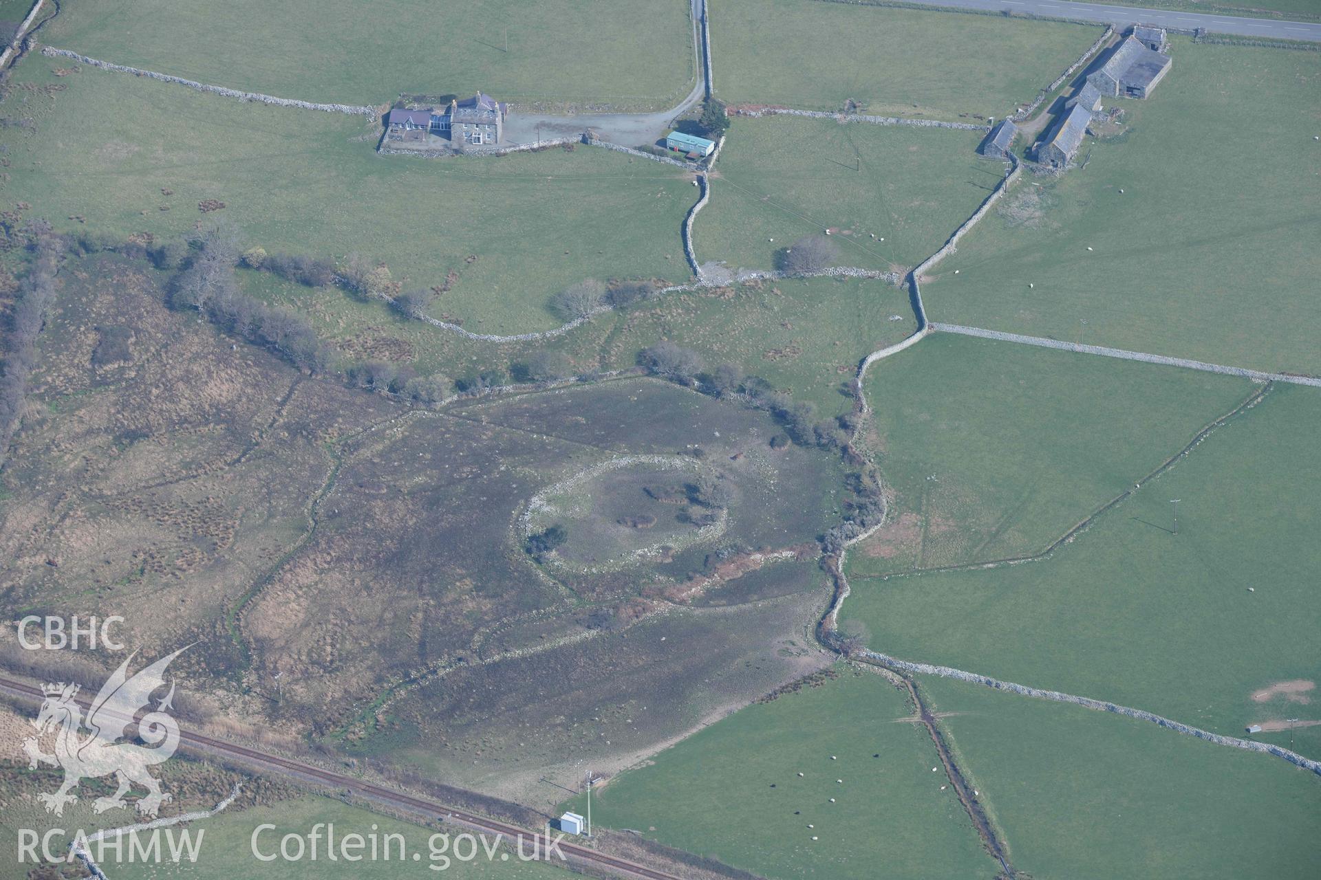 Sebonig/Tyddyn Mawr homestead enclosure. Oblique aerial photographs taken during the Royal Commission’s programme of archaeological aerial reconnaissance by Toby Driver on 25 March 2022.