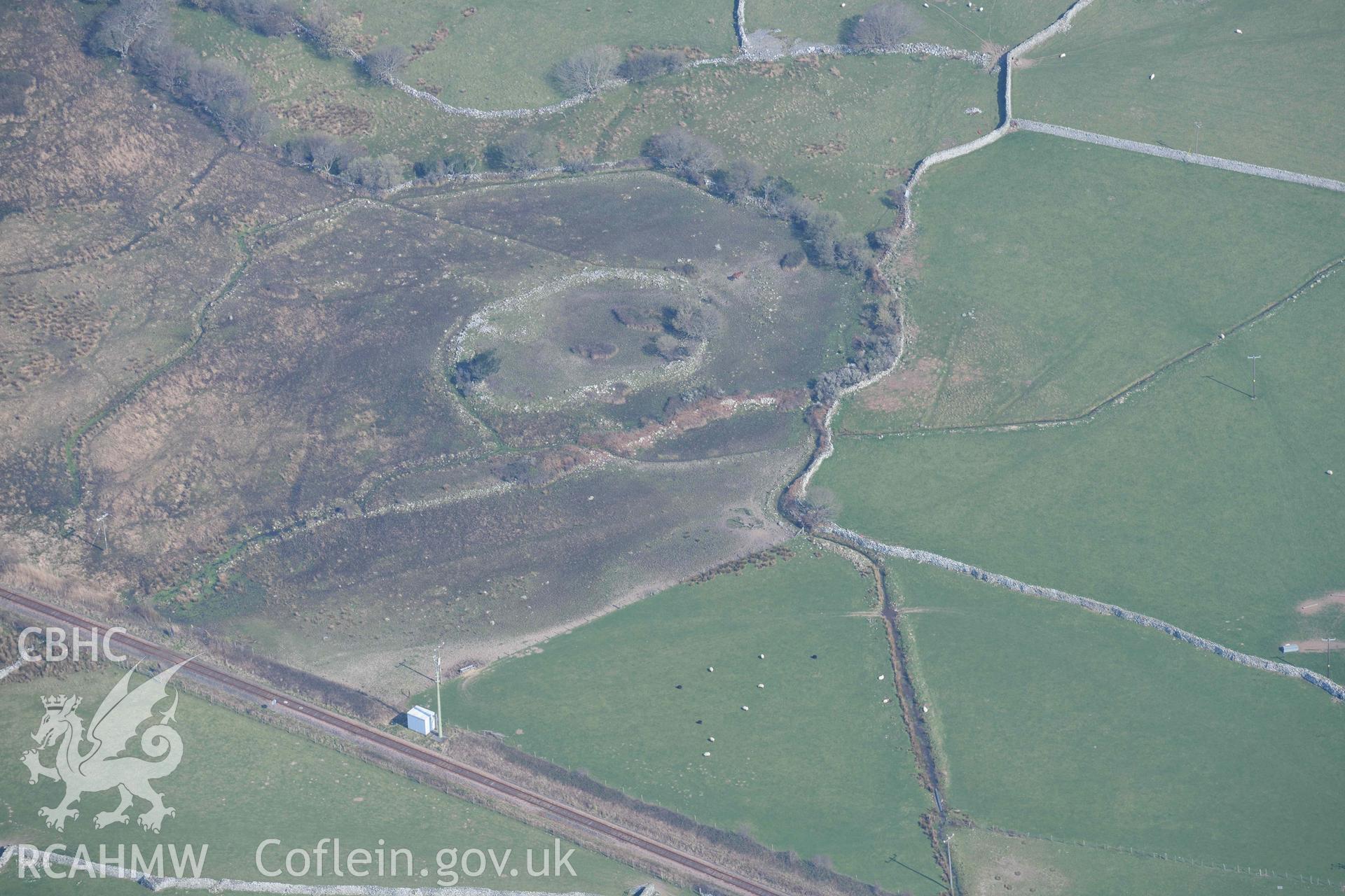 Sebonig/Tyddyn Mawr homestead enclosure. Oblique aerial photographs taken during the Royal Commission’s programme of archaeological aerial reconnaissance by Toby Driver on 25 March 2022.