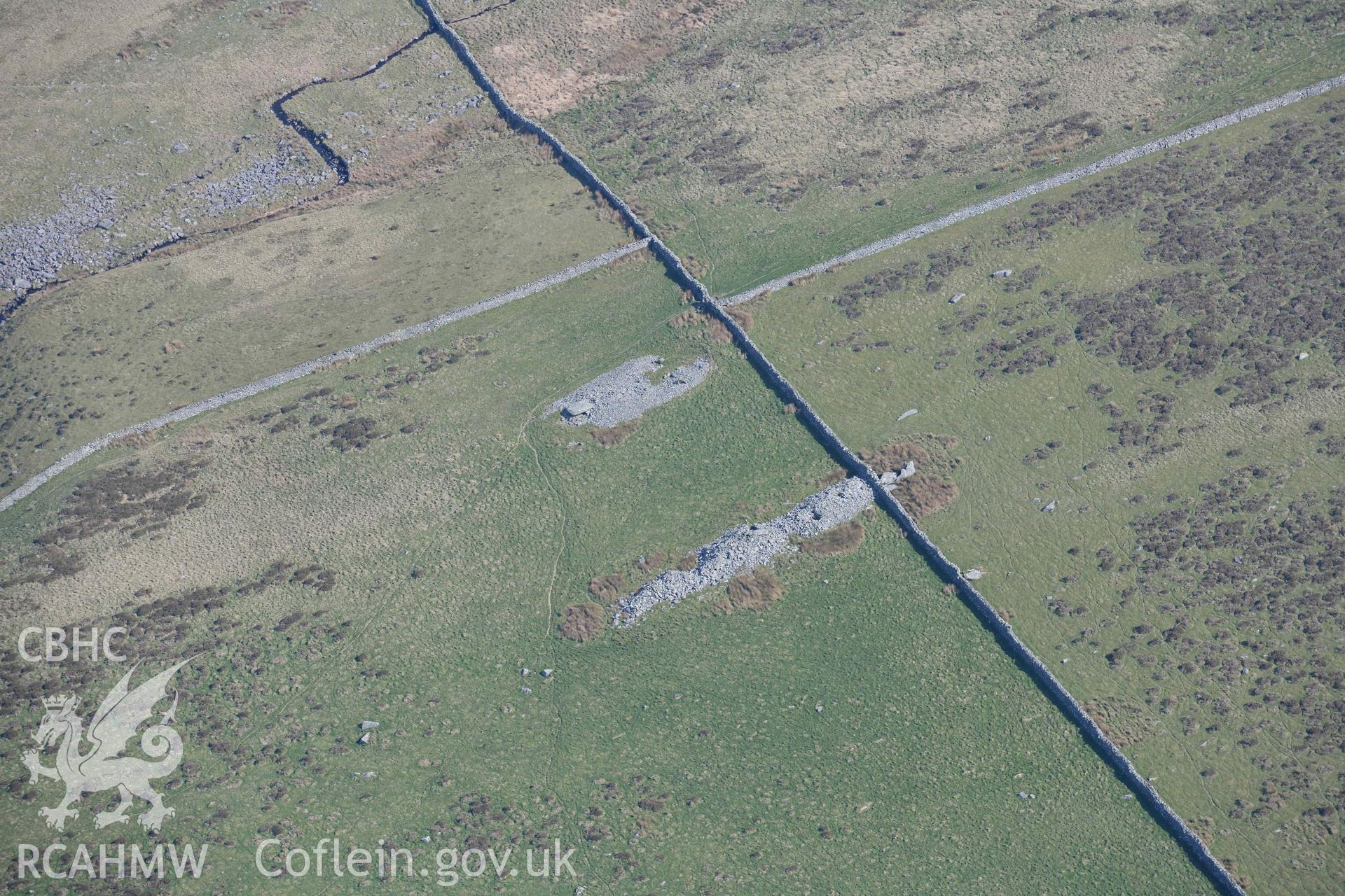 Carneddau Hengwm, chambered long cairns. Oblique aerial photograph taken during the Royal Commission’s programme of archaeological aerial reconnaissance by Toby Driver on 25 March 2022.