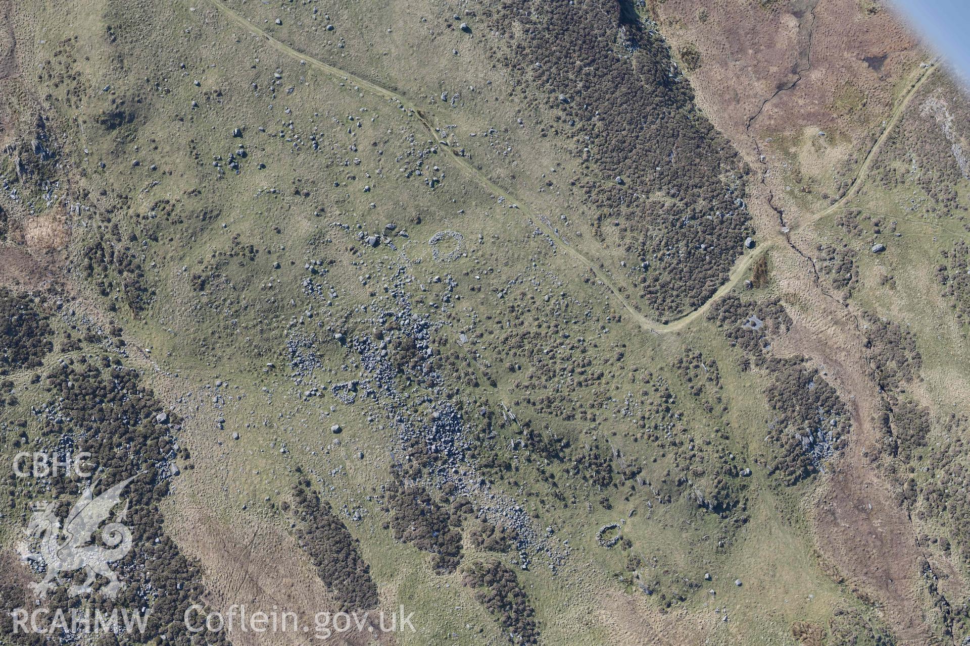 Hut circles east of Moel Geifr. Oblique aerial photographs taken during the Royal Commission’s programme of archaeological aerial reconnaissance by Toby Driver on 25 March 2022.