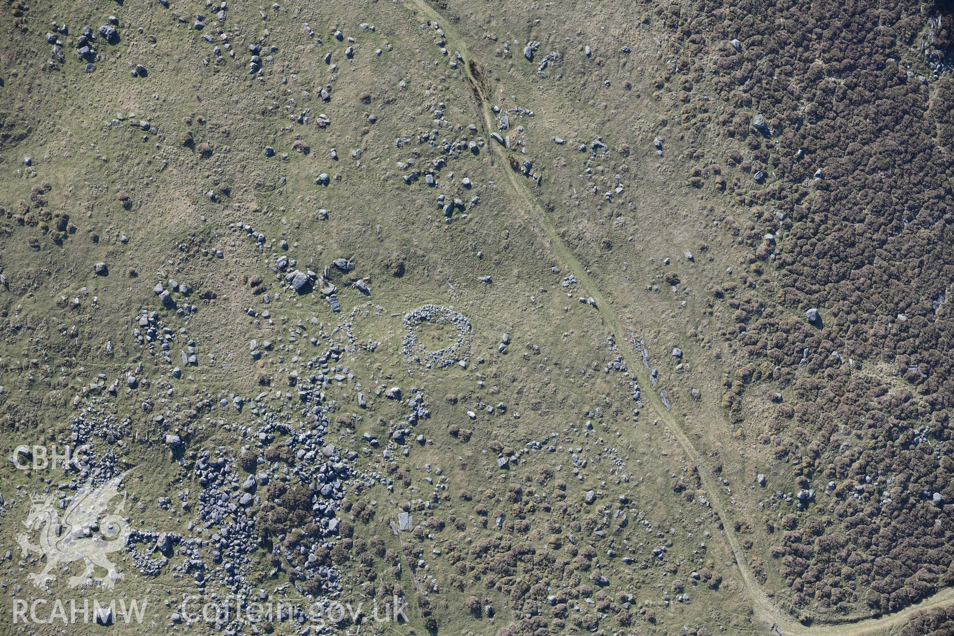 Hut circles east of Moel Geifr. Oblique aerial photographs taken during the Royal Commission’s programme of archaeological aerial reconnaissance by Toby Driver on 25 March 2022.