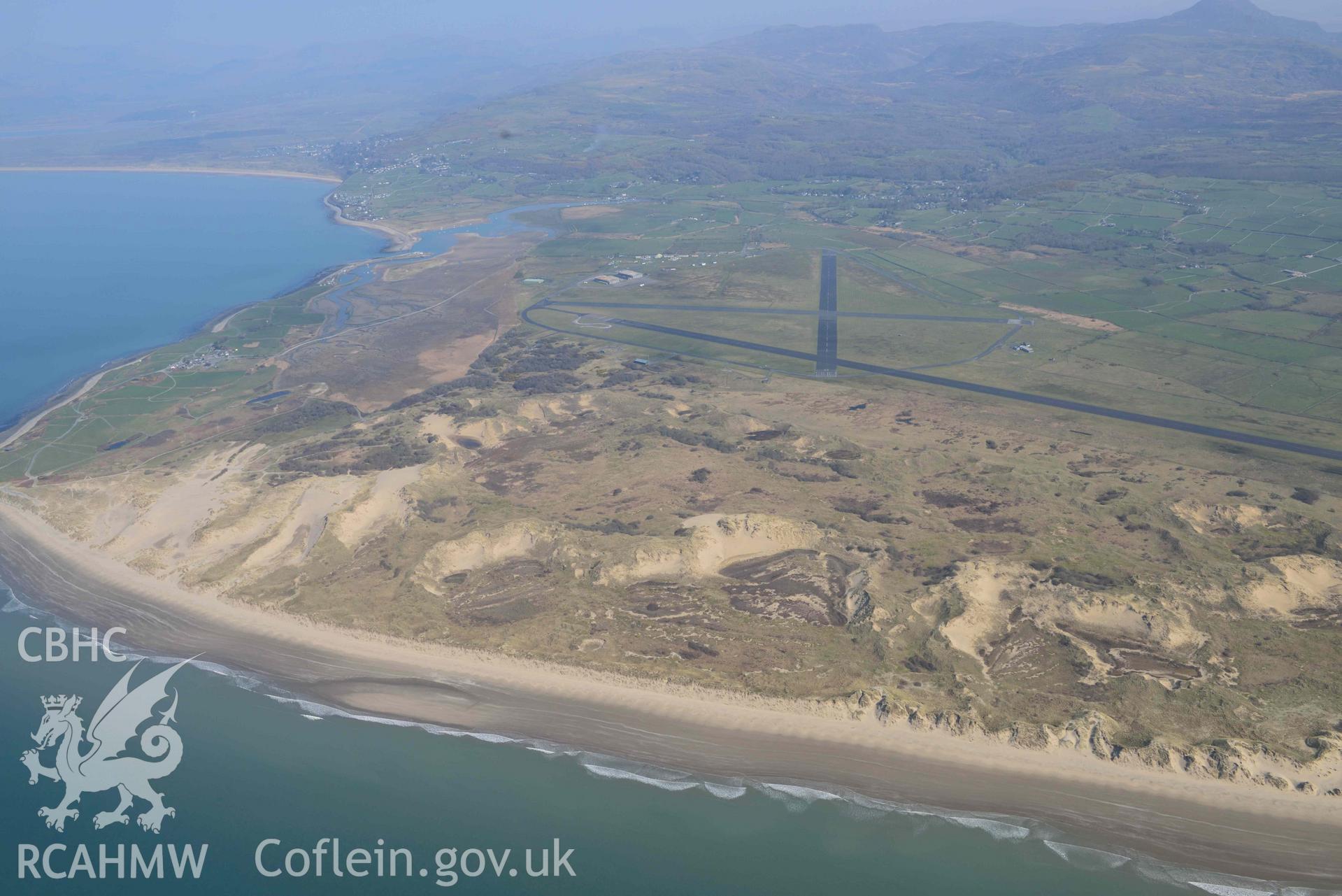 Llanbedr Airfield, view from the southwest. Oblique aerial photograph taken during the Royal Commission’s programme of archaeological aerial reconnaissance by Toby Driver on 25 March 2022.