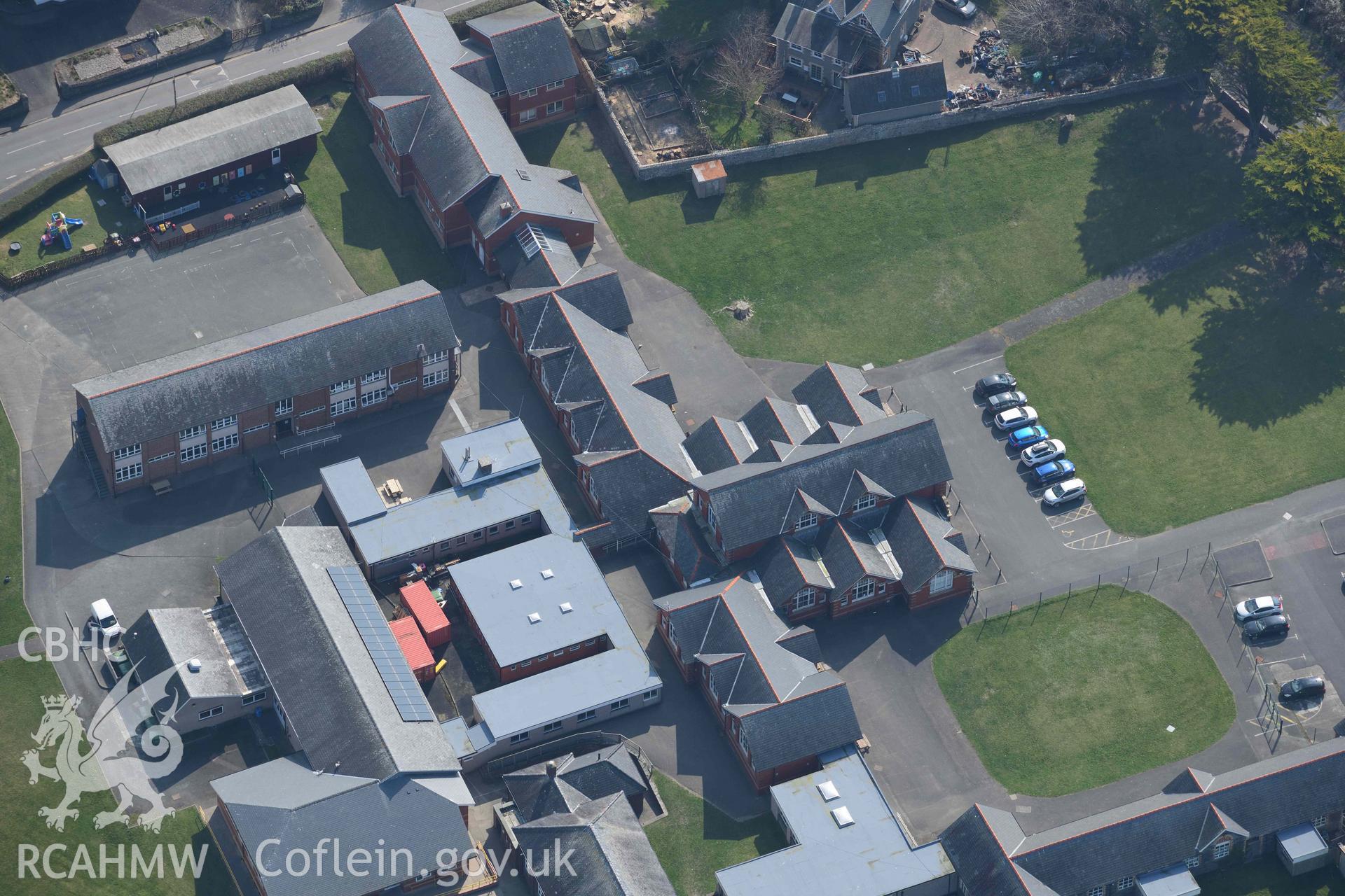 Ysgol Uwchradd Tywyn. Oblique aerial photograph taken during the Royal Commission’s programme of archaeological aerial reconnaissance by Toby Driver on 25 March 2022.