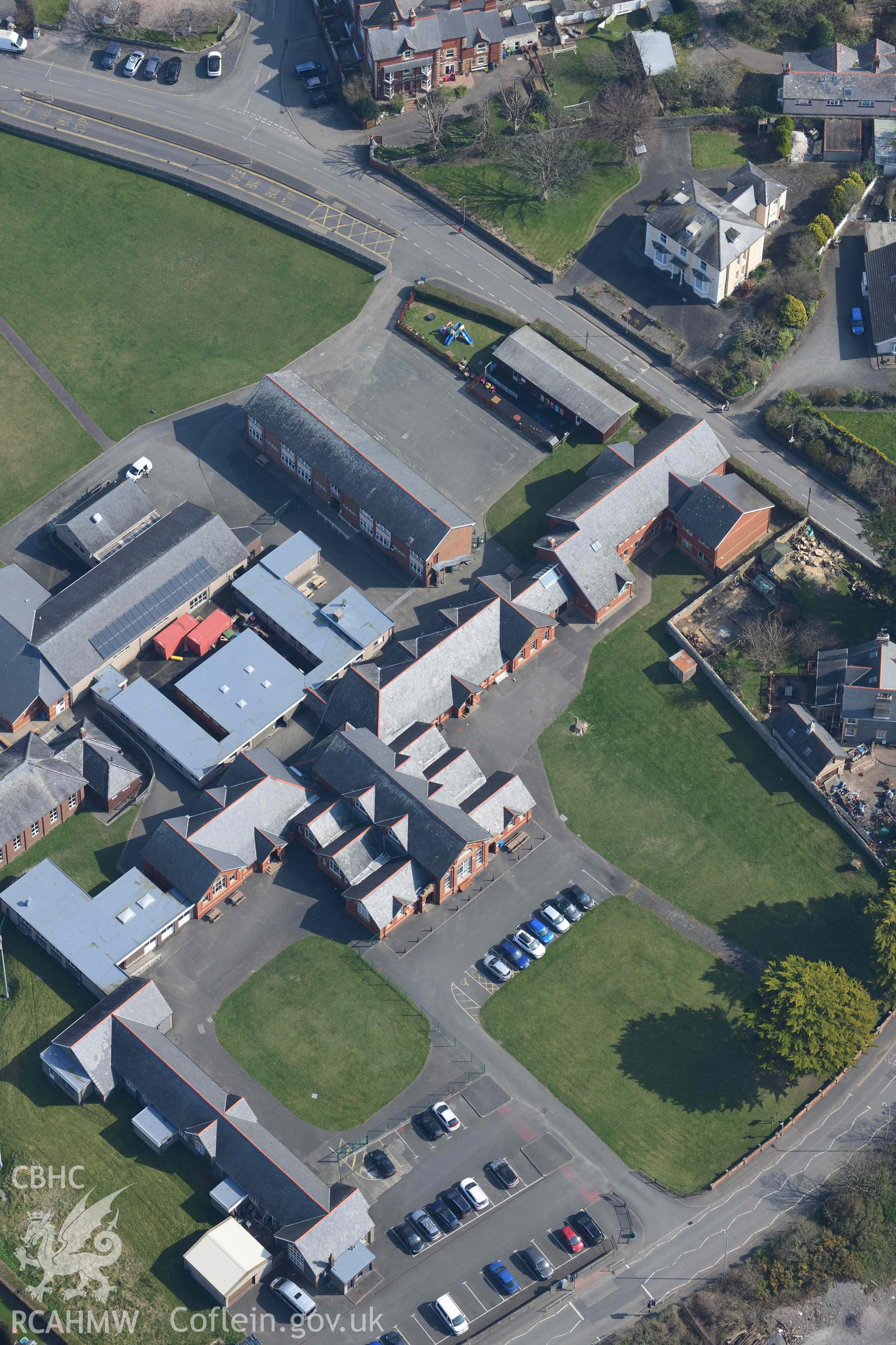 Ysgol Uwchradd Tywyn. Oblique aerial photograph taken during the Royal Commission’s programme of archaeological aerial reconnaissance by Toby Driver on 25 March 2022.