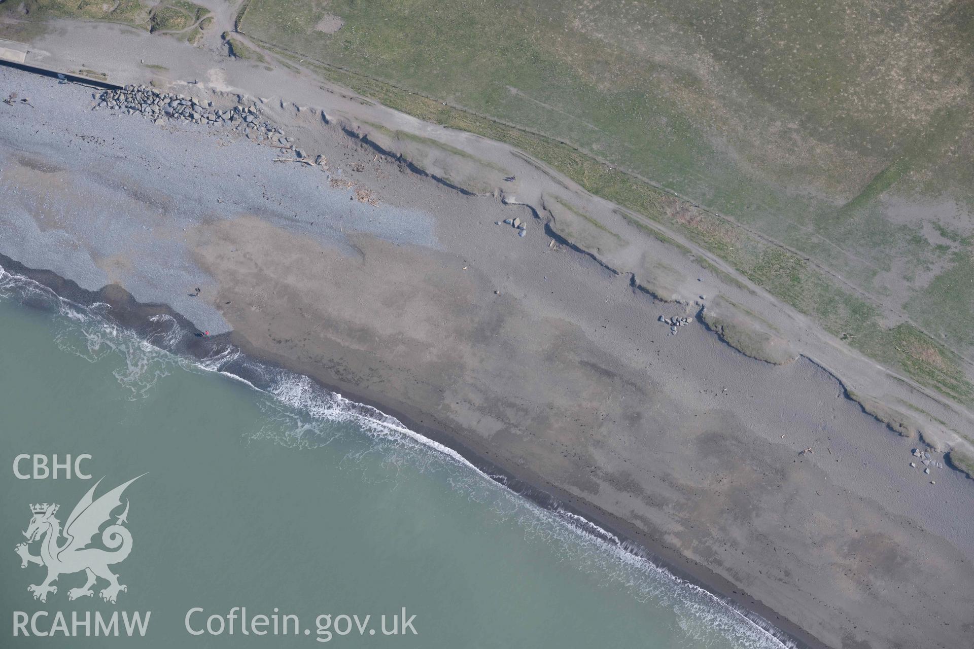 Tanybwlch Beach, storm damage to wall. Oblique aerial photograph taken during the Royal Commission’s programme of archaeological aerial reconnaissance by Toby Driver on 25 March 2022.