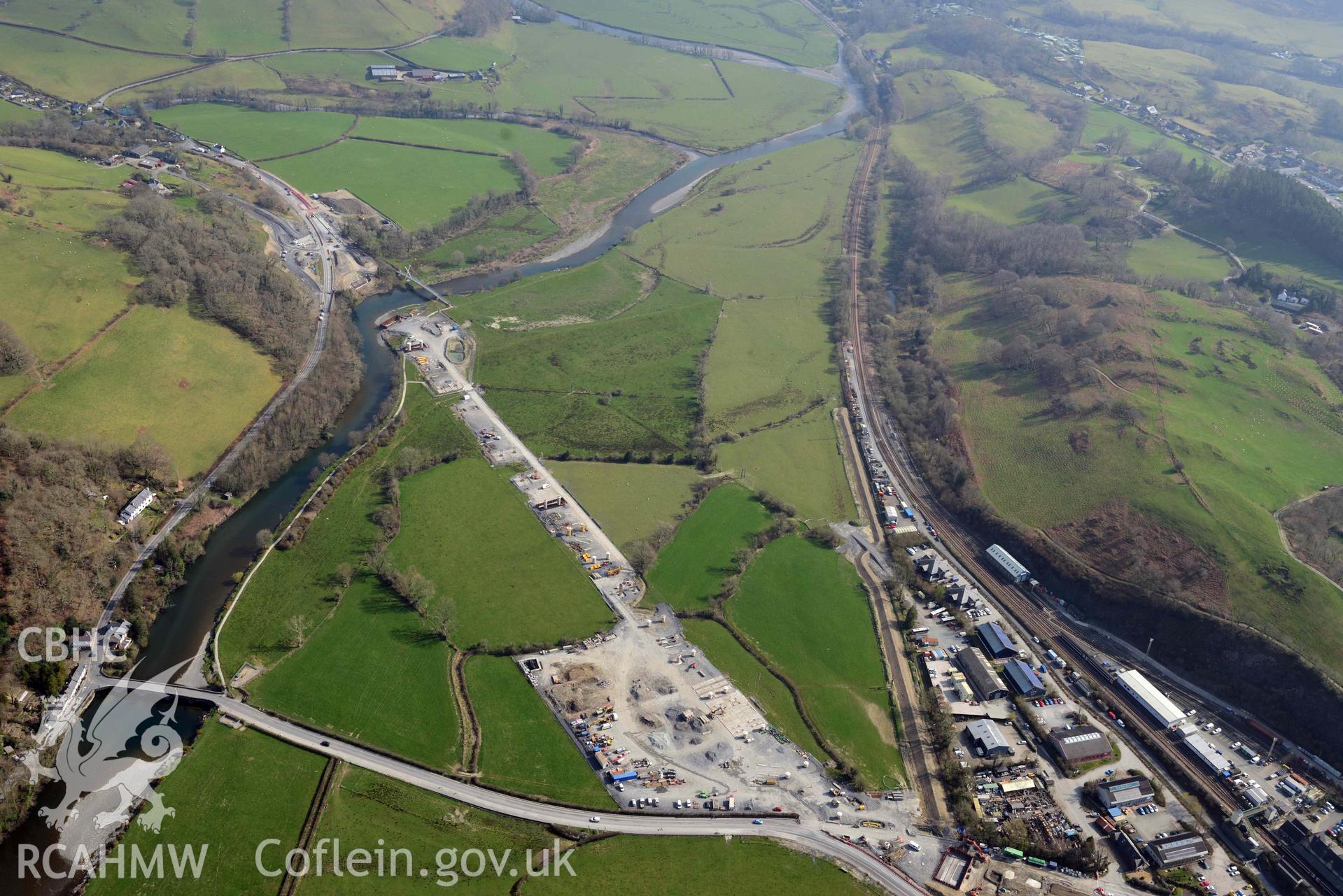 A487 New Dyfi Bridge under construction. Oblique aerial photograph taken during the Royal Commission’s programme of archaeological aerial reconnaissance by Toby Driver on 25 March 2022.