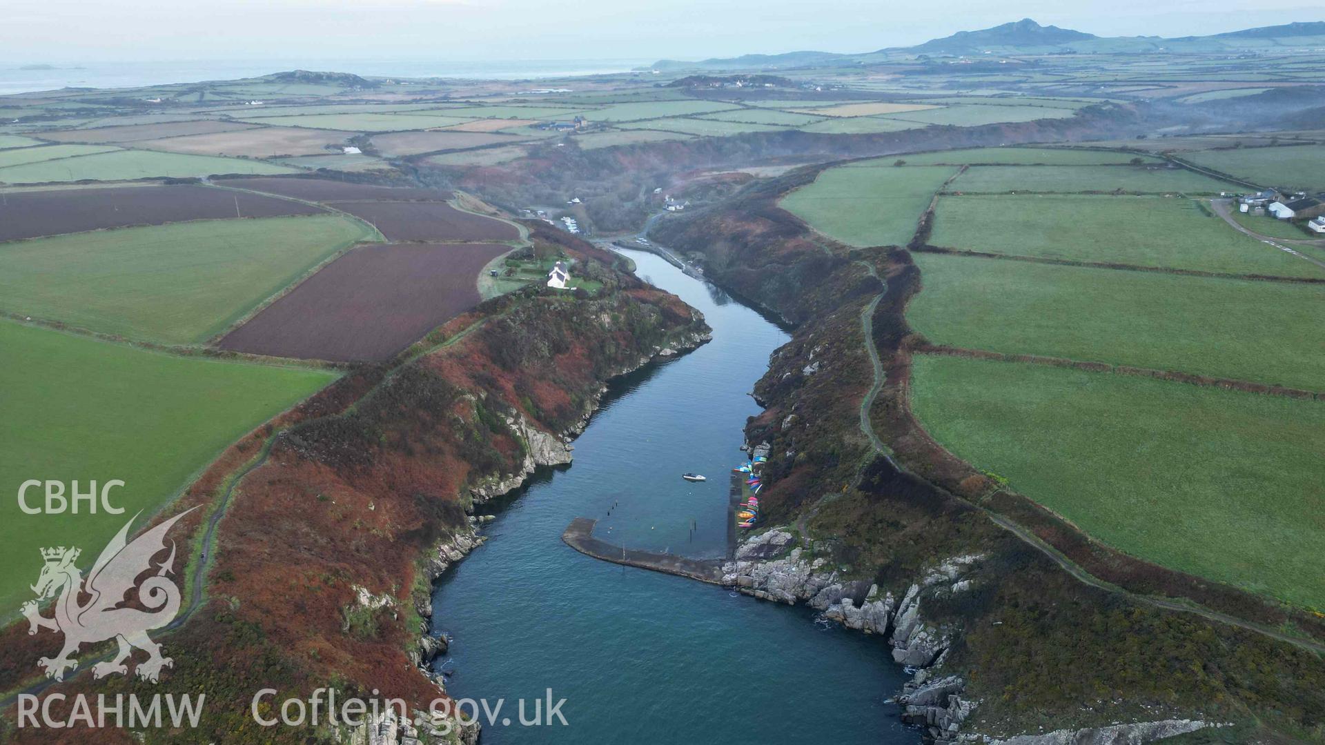 Oblique, high-level view of Porthclais Harbour, from seaward, at high tide on 11 March 2024.