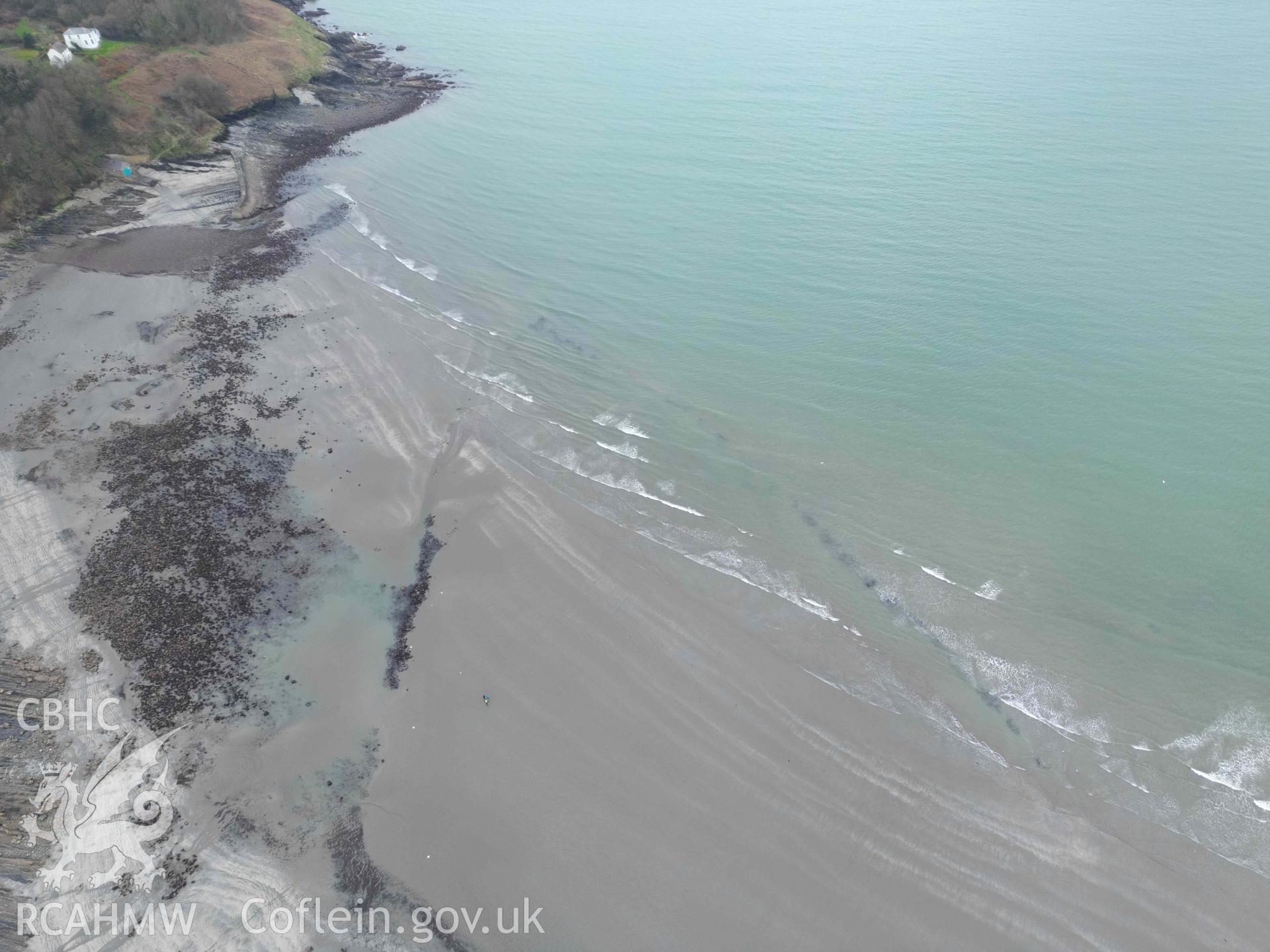 Oblique view of Poppit fish trap on 11 March 2024. The apex of the trap is just visible beyond the waves in the centre of the image.