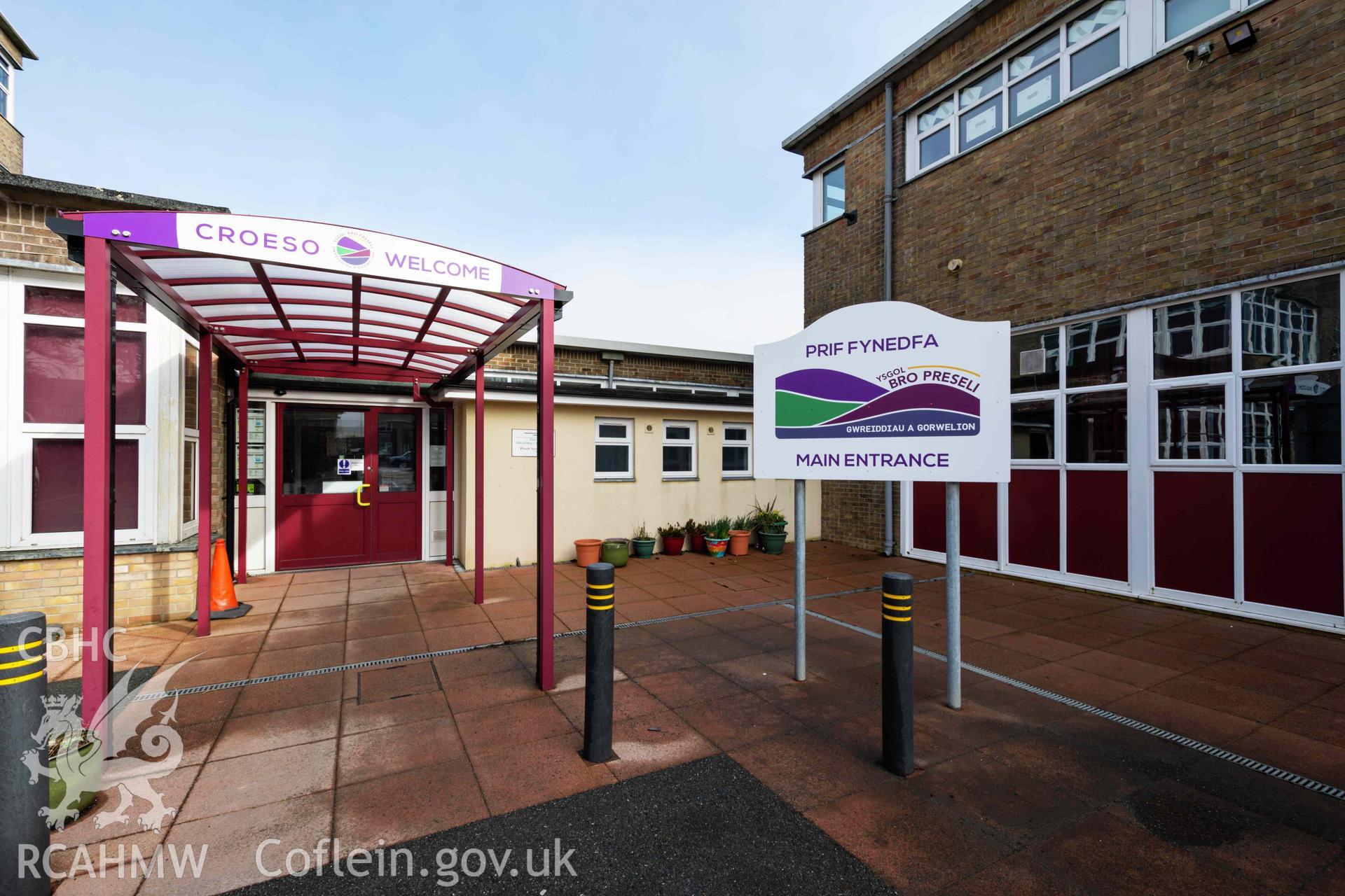 Sings at main entrance. Ysgol Bro Preseli