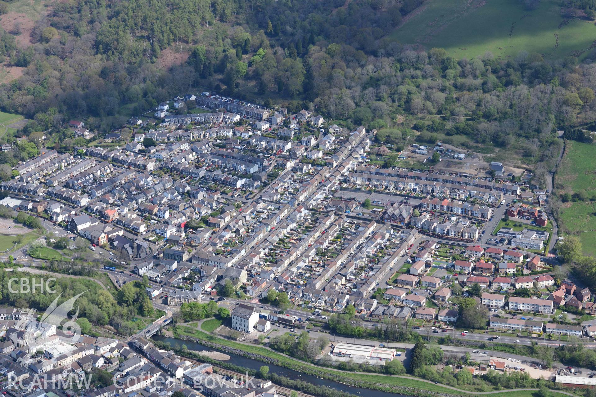 Mountain Ash, terraced housing from the South West. Oblique aerial photograph taken during the Royal Commission's programme of archaeological aerial reconnaissance by Toby Driver on 29 April 2022.