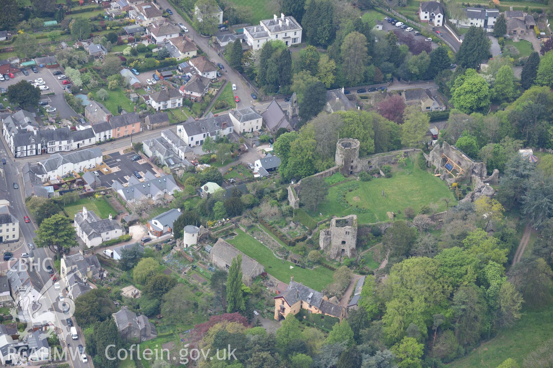 Usk Castle. Oblique aerial photograph taken during the Royal Commission's programme of archaeological aerial reconnaissance by Toby Driver on 29 April 2022.