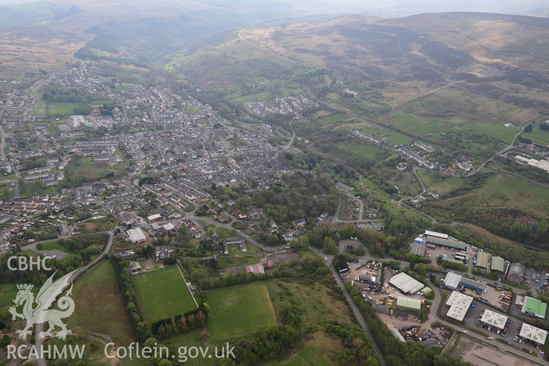 Blaenavon town, view looking south east over the ironworks. Oblique aerial photograph taken during the Royal Commission's programme of archaeological aerial reconnaissance by Toby Driver on 29 April 2022.