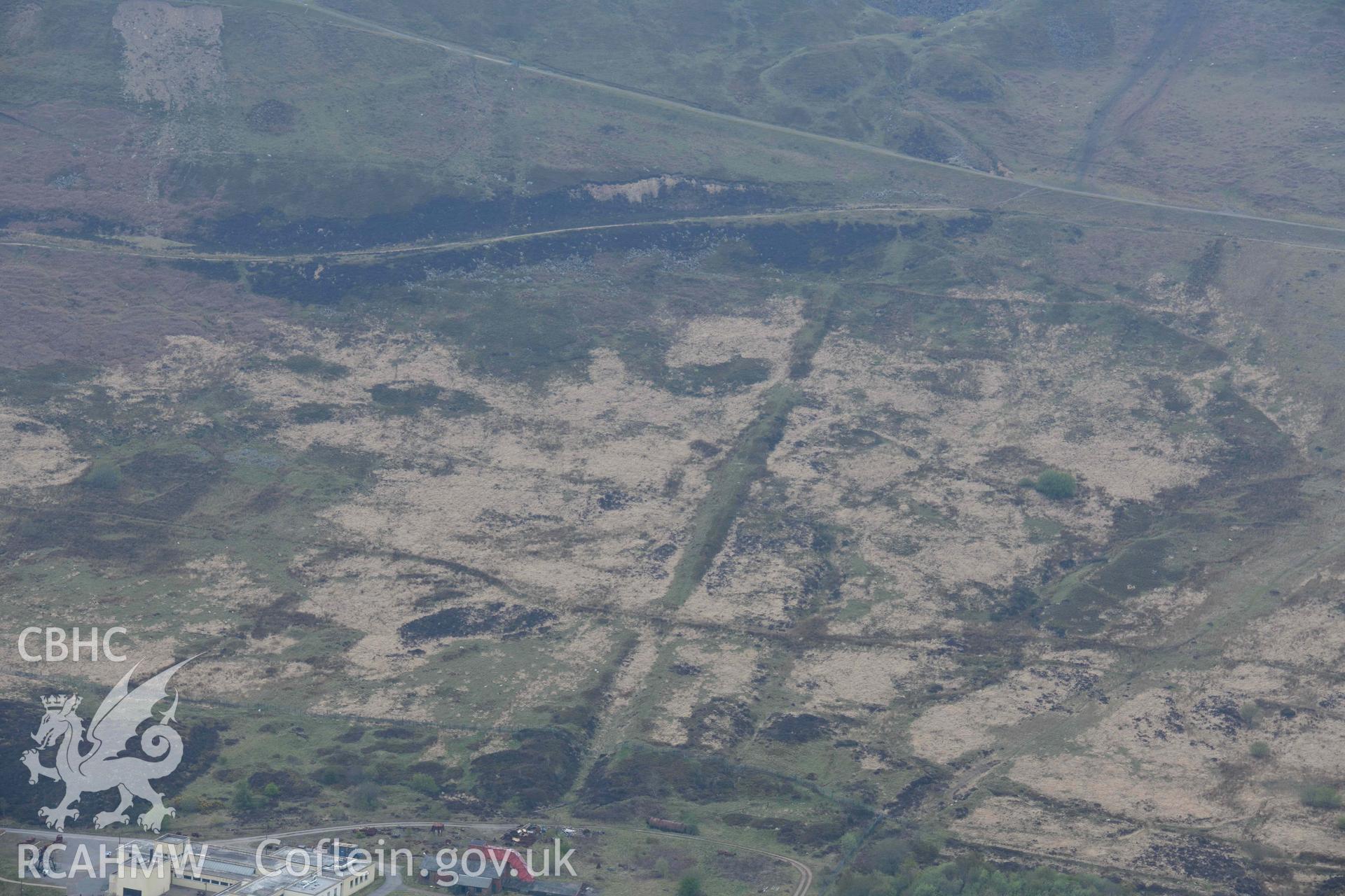 Coity Mawr quarry incline, view from the North East. Oblique aerial photograph taken during the Royal Commission's programme of archaeological aerial reconnaissance by Toby Driver on 29 April 2022.