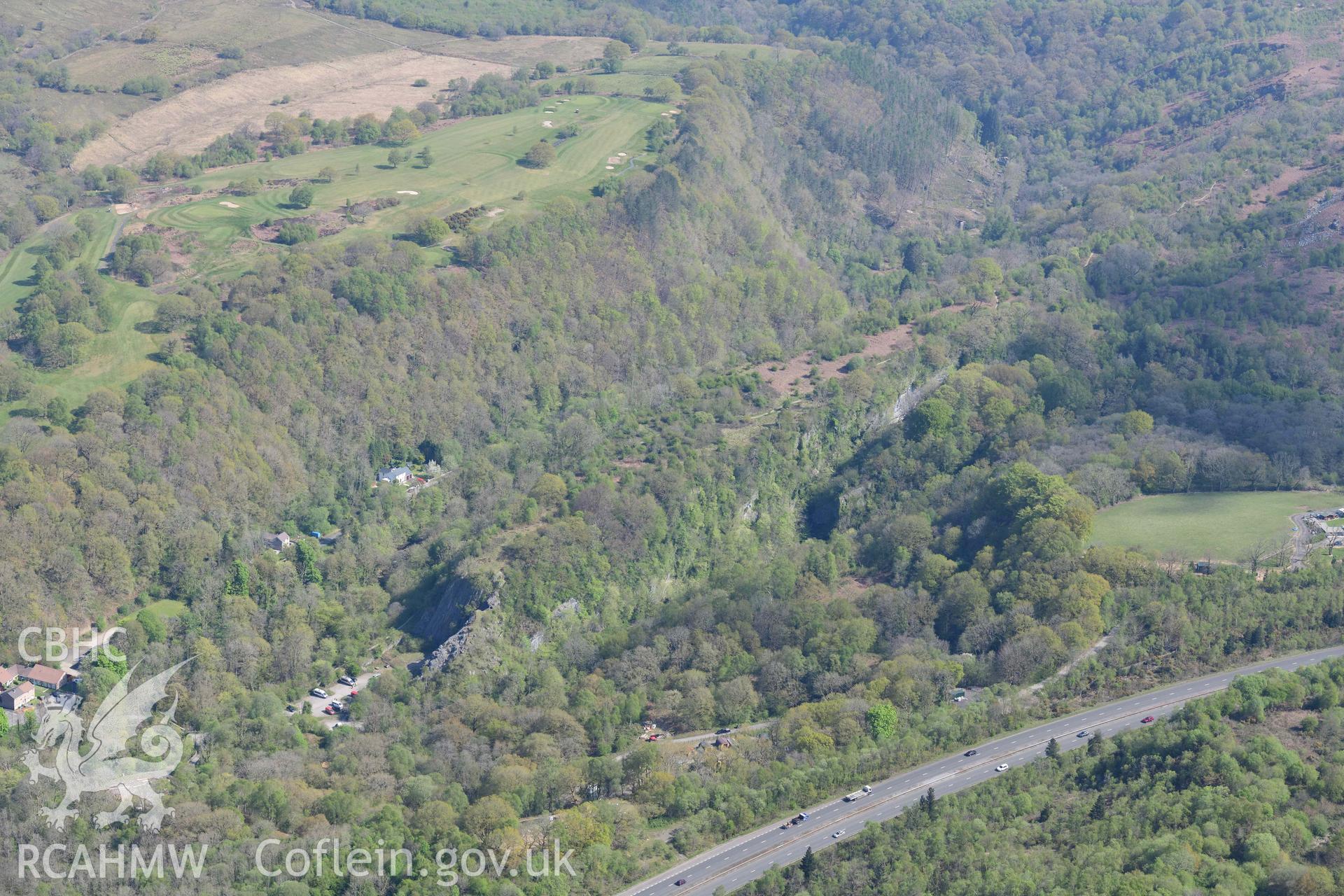 Craig y Dinas promontory fort. Oblique aerial photograph taken during the Royal Commission's programme of archaeological aerial reconnaissance by Toby Driver on 29 April 2022.