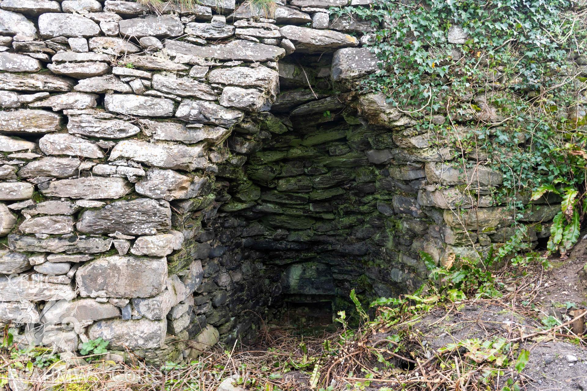 Kiln 3, kiln-eye, west elevation. Part of photographic survey of Aberstrincell lime kilns and coal yard, conducted by Louise Barker of the RCAHMW survey team on 21 March 2024.