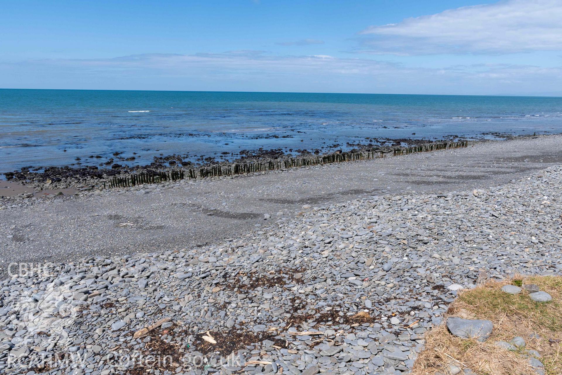 Jetty, Aberstrincell (SN5219768701), looking north. Part of photographic survey of Aberstrincell lime kilns and coal yard, conducted by Louise Barker of the RCAHMW survey team on 21 March 2024.