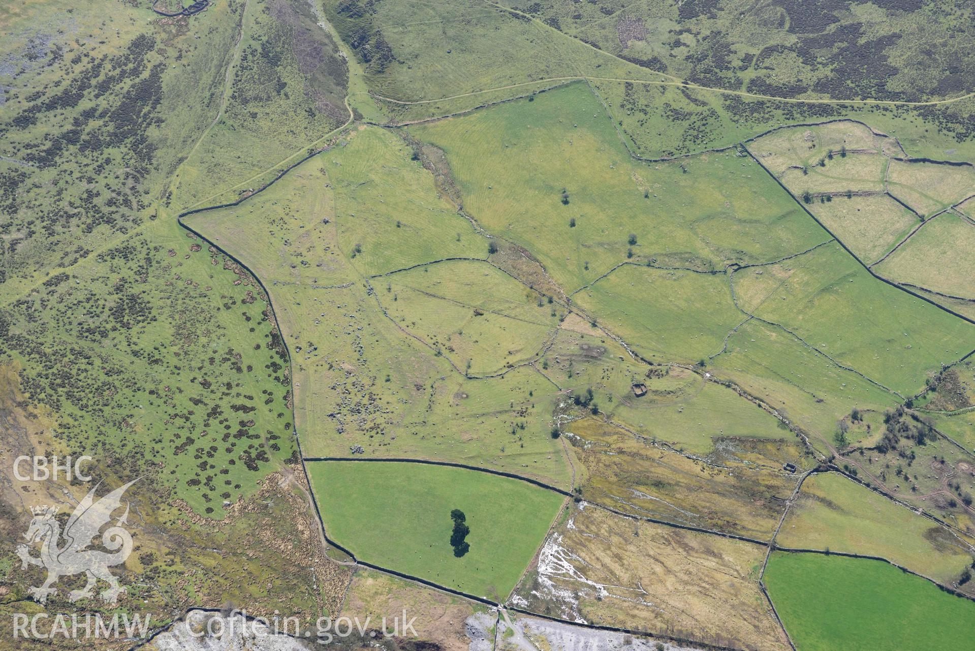 Moel Faban early field system, view from north. Oblique aerial photograph taken during the Royal Commission’s programme of archaeological aerial reconnaissance by Toby Driver on 20 April 2018.