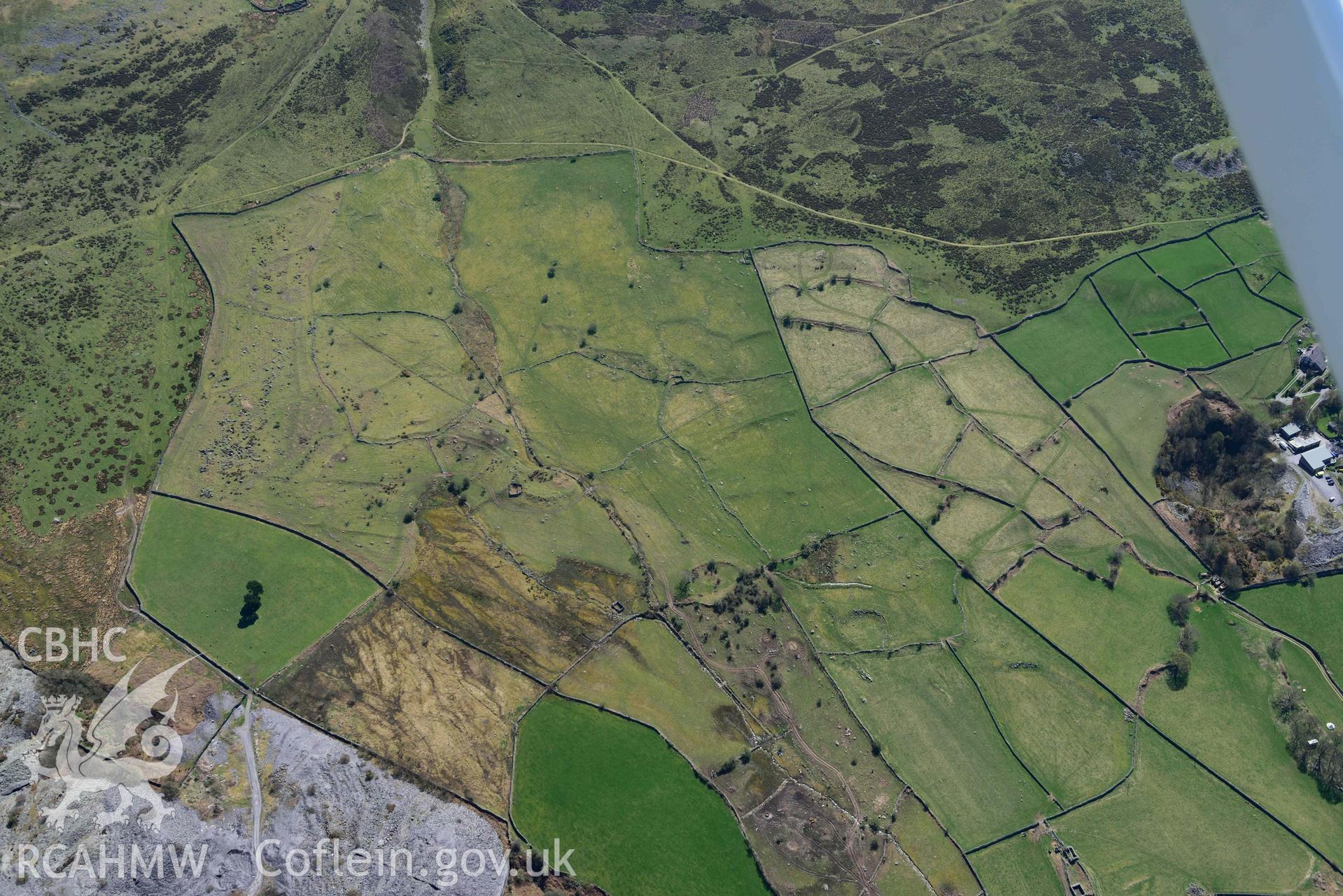 Moel Faban early field system, view from west. Oblique aerial photograph taken during the Royal Commission’s programme of archaeological aerial reconnaissance by Toby Driver on 20 April 2018.