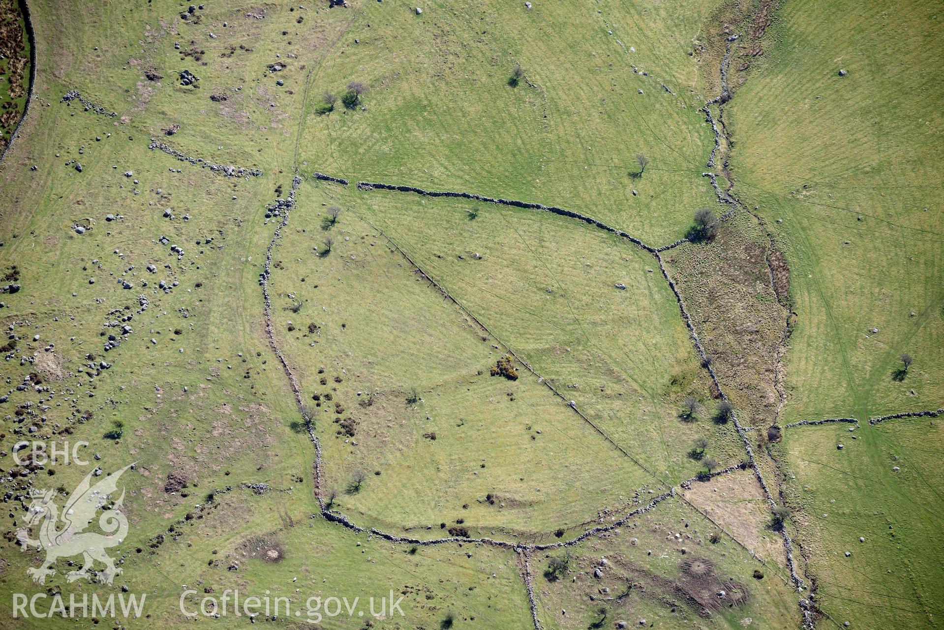 Moel Faban early field system, cultivation ridges from north-west. Oblique aerial photograph taken during the Royal Commission’s programme of archaeological aerial reconnaissance by Toby Driver on 20 April 2018.