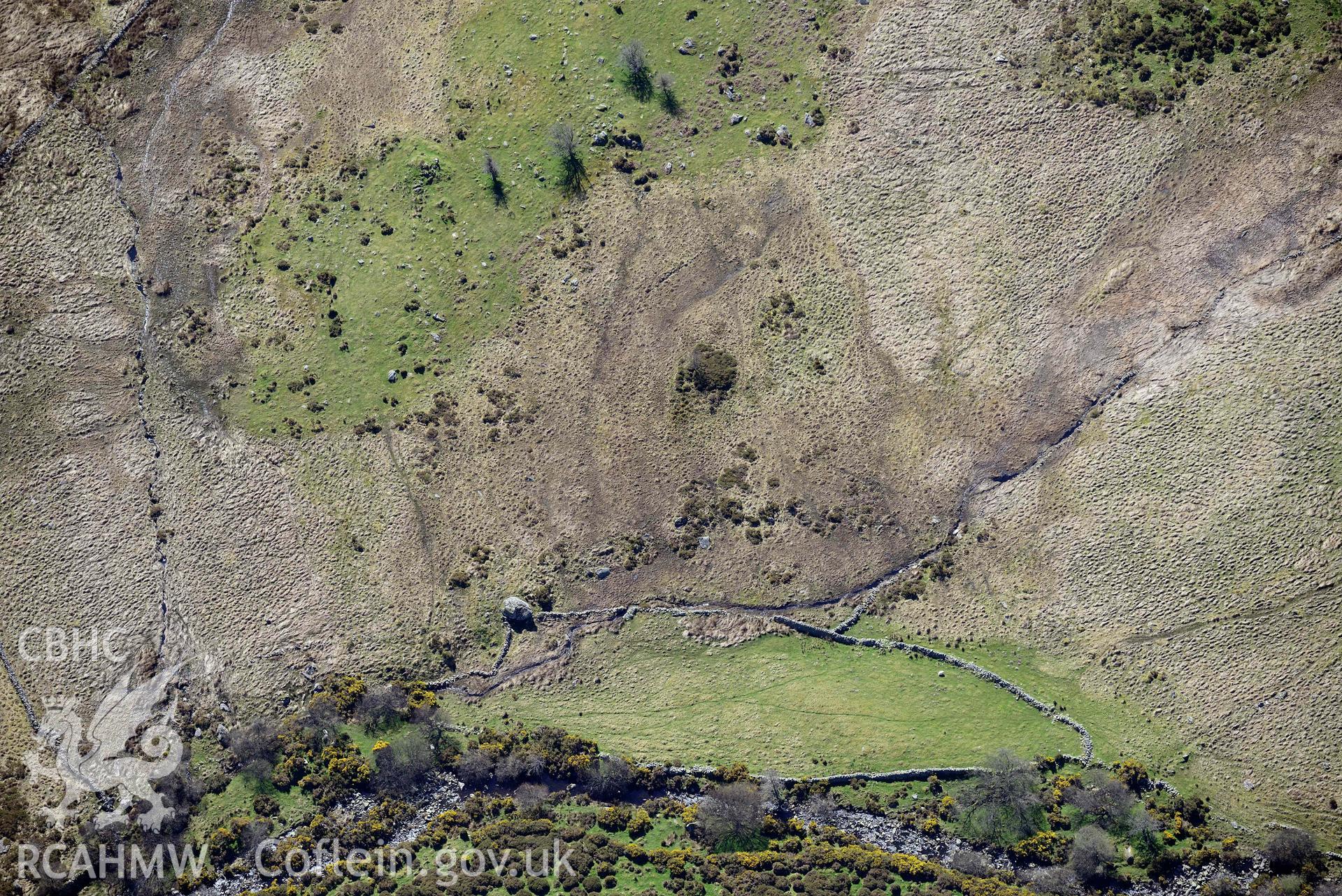 Hafod-y-Garreg, deserted rural settlement, landscape to the north east. Oblique aerial photograph taken during the Royal Commission’s programme of archaeological aerial reconnaissance by Toby Driver on 20 April 2018.