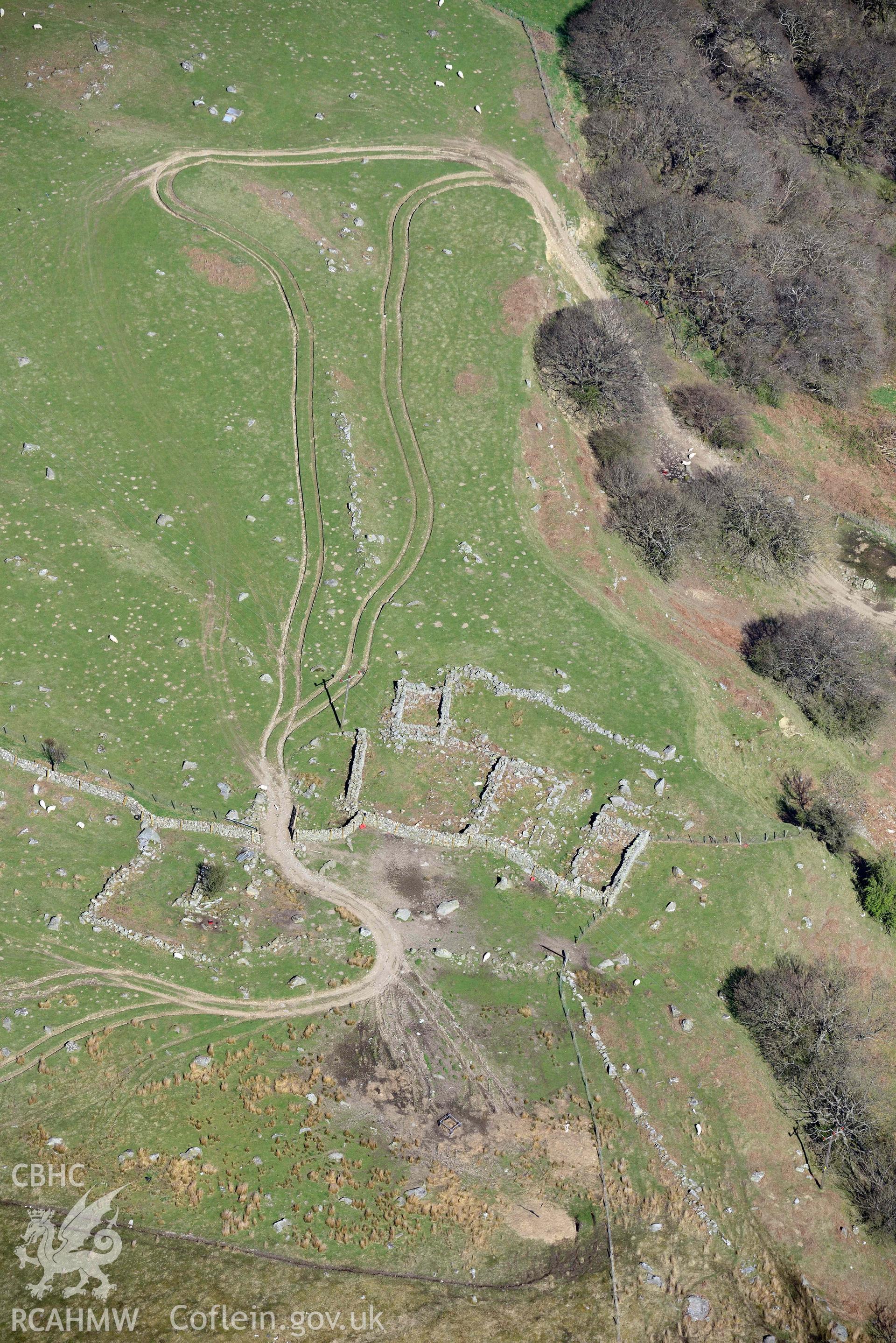 Garreg Fawr longhouse, view from south over Cammarnaint. Oblique aerial photograph taken during the Royal Commission’s programme of archaeological aerial reconnaissance by Toby Driver on 20 April 2018.