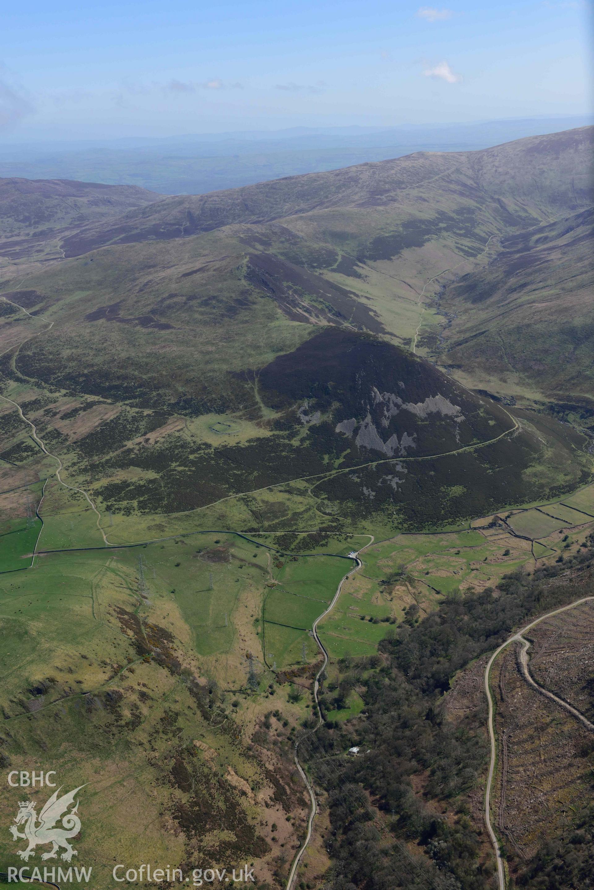 Hafod y Gelyn hut group and settlement, view from west with Foel Dduarth. Oblique aerial photograph taken during the Royal Commission’s programme of archaeological aerial reconnaissance by Toby Driver on 20 April 2018.