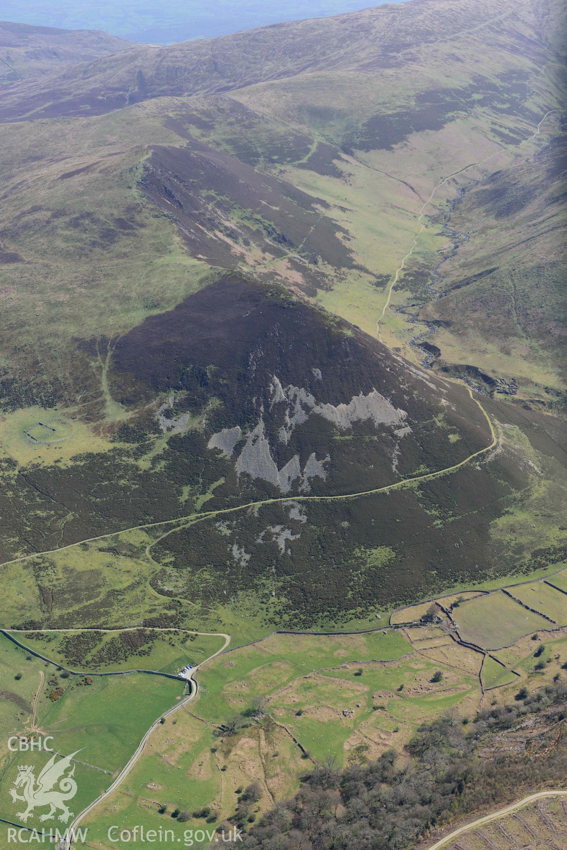 Hafod y Gelyn hut group and settlement, view from west with Foel Dduarth. Oblique aerial photograph taken during the Royal Commission’s programme of archaeological aerial reconnaissance by Toby Driver on 20 April 2018.