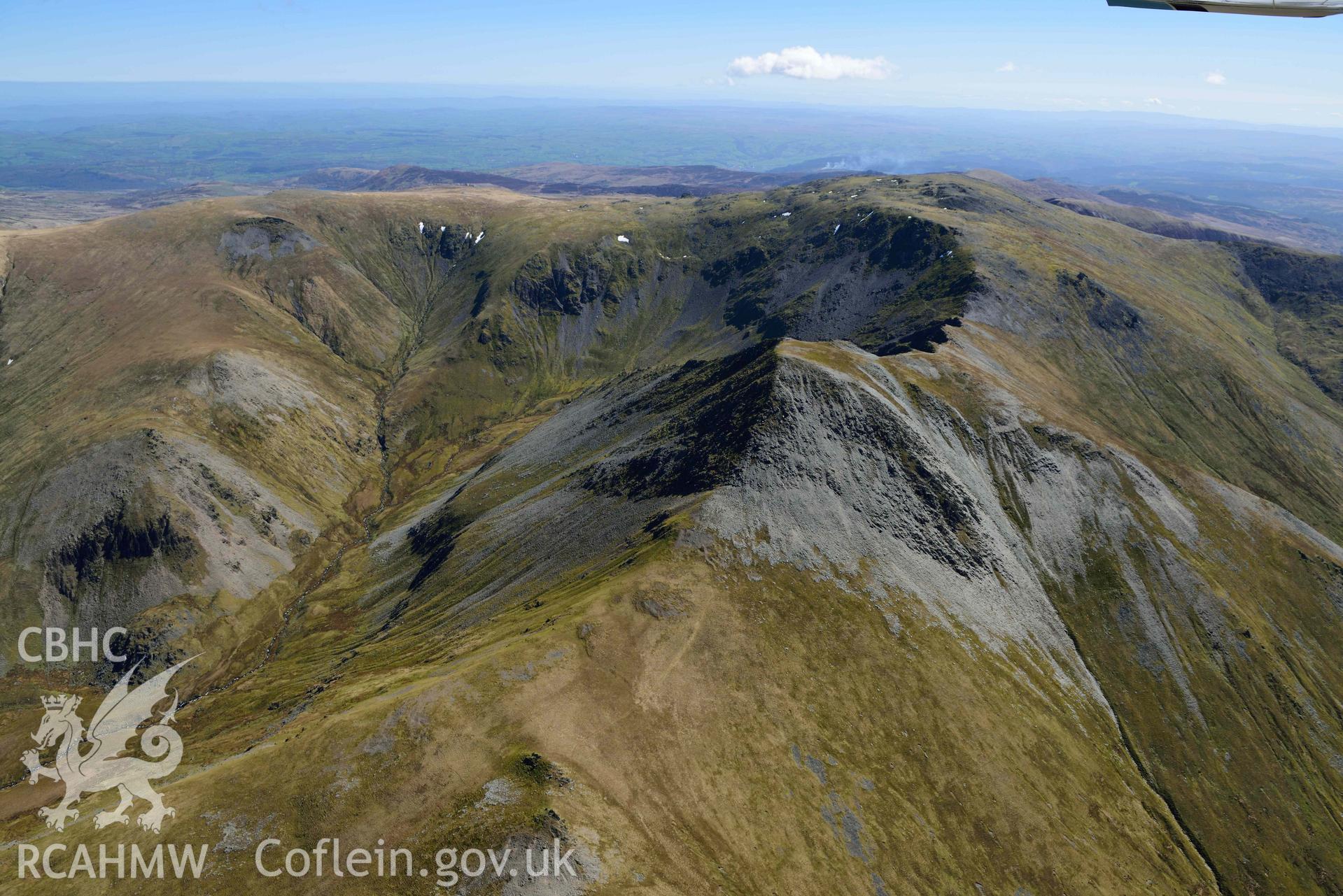 Carnedd Llewelyn, view looking east over Yr Elen and Braich y Llyngwyn. Oblique aerial photograph taken during the Royal Commission’s programme of archaeological aerial reconnaissance by Toby Driver on 20 April 2018.