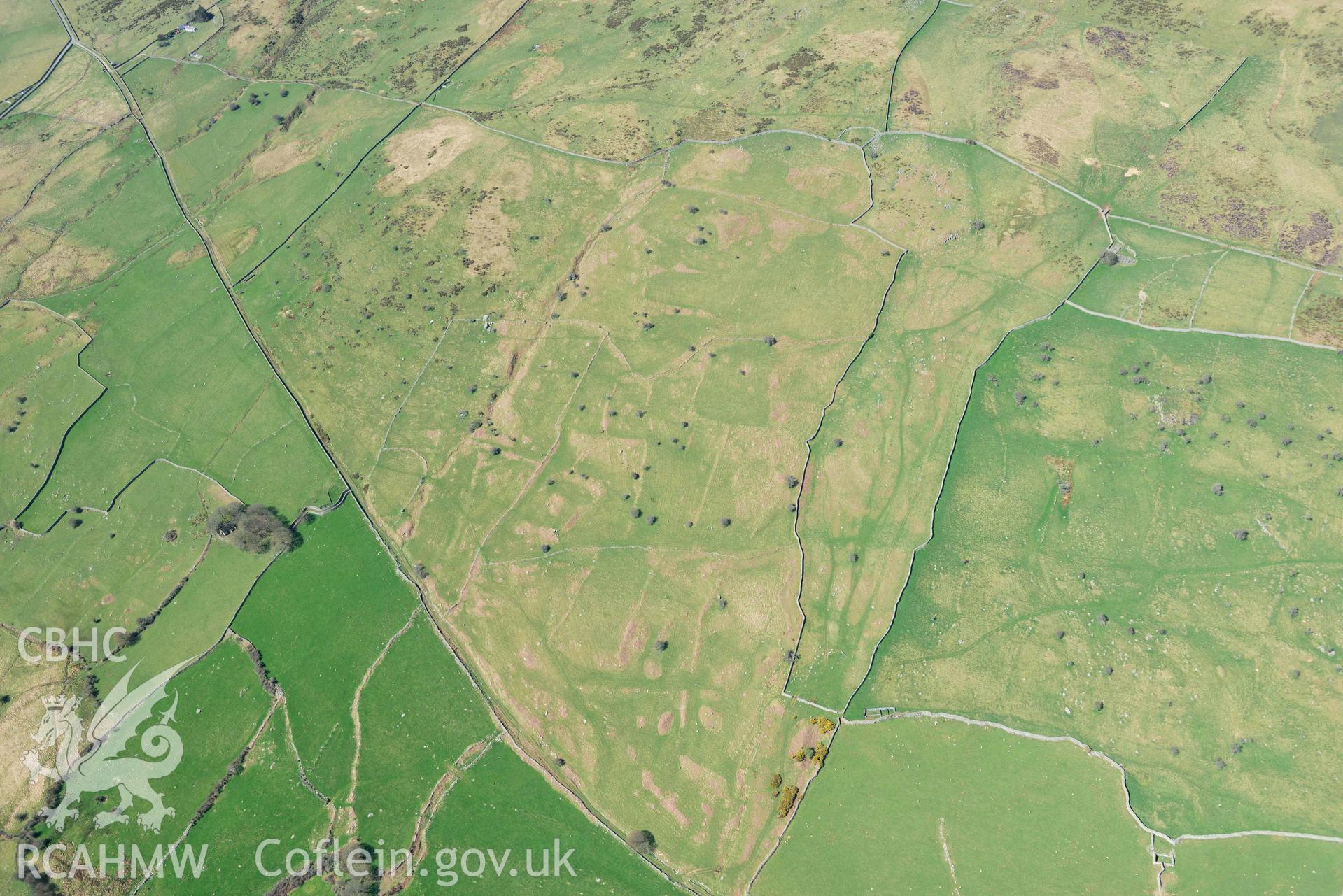 Field system near Maen y Bardd. Oblique aerial photograph taken during the Royal Commission’s programme of archaeological aerial reconnaissance by Toby Driver on 20 April 2018.