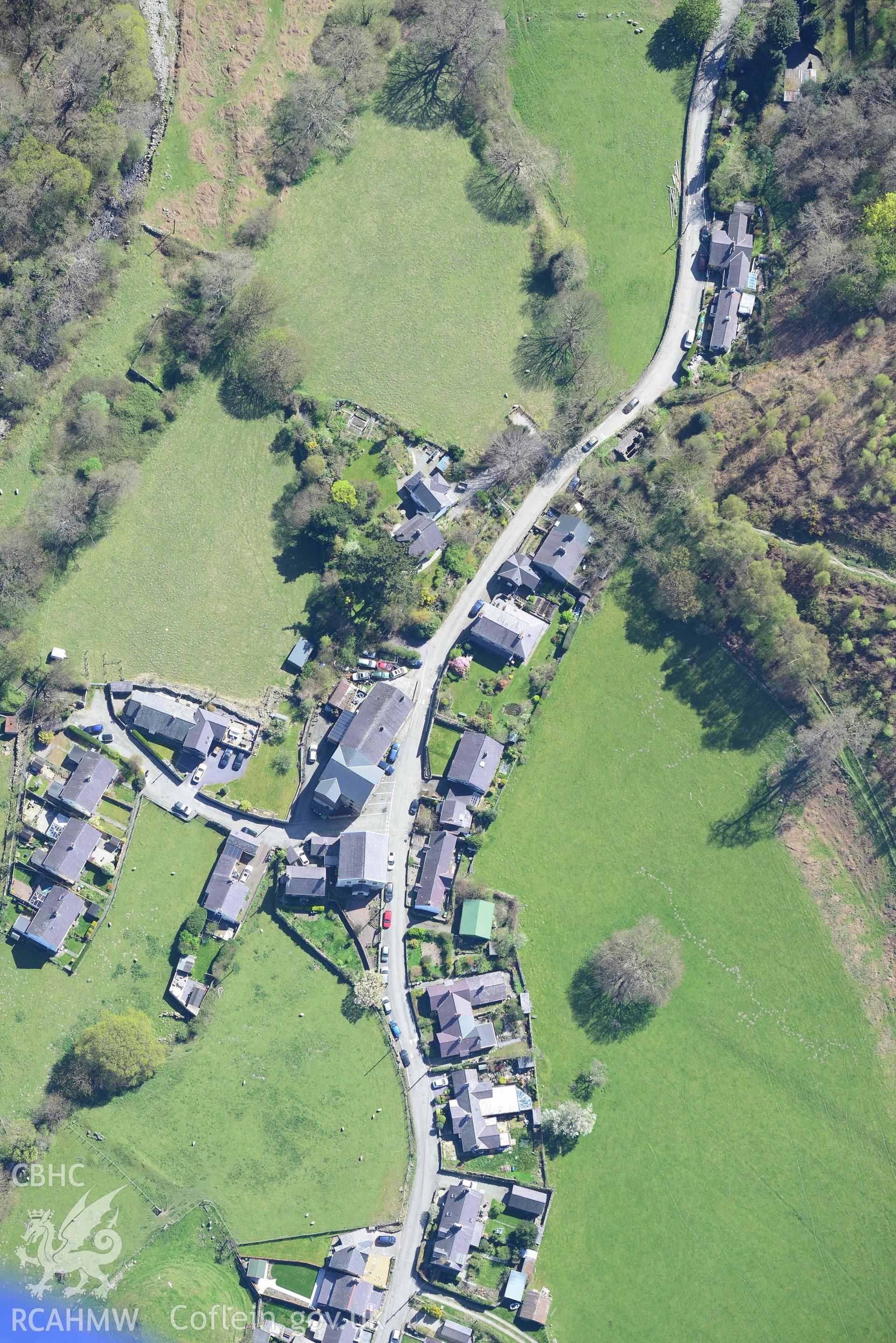 Aber Llys, and village. Oblique aerial photograph taken during the Royal Commission’s programme of archaeological aerial reconnaissance by Toby Driver on 20 April 2018.