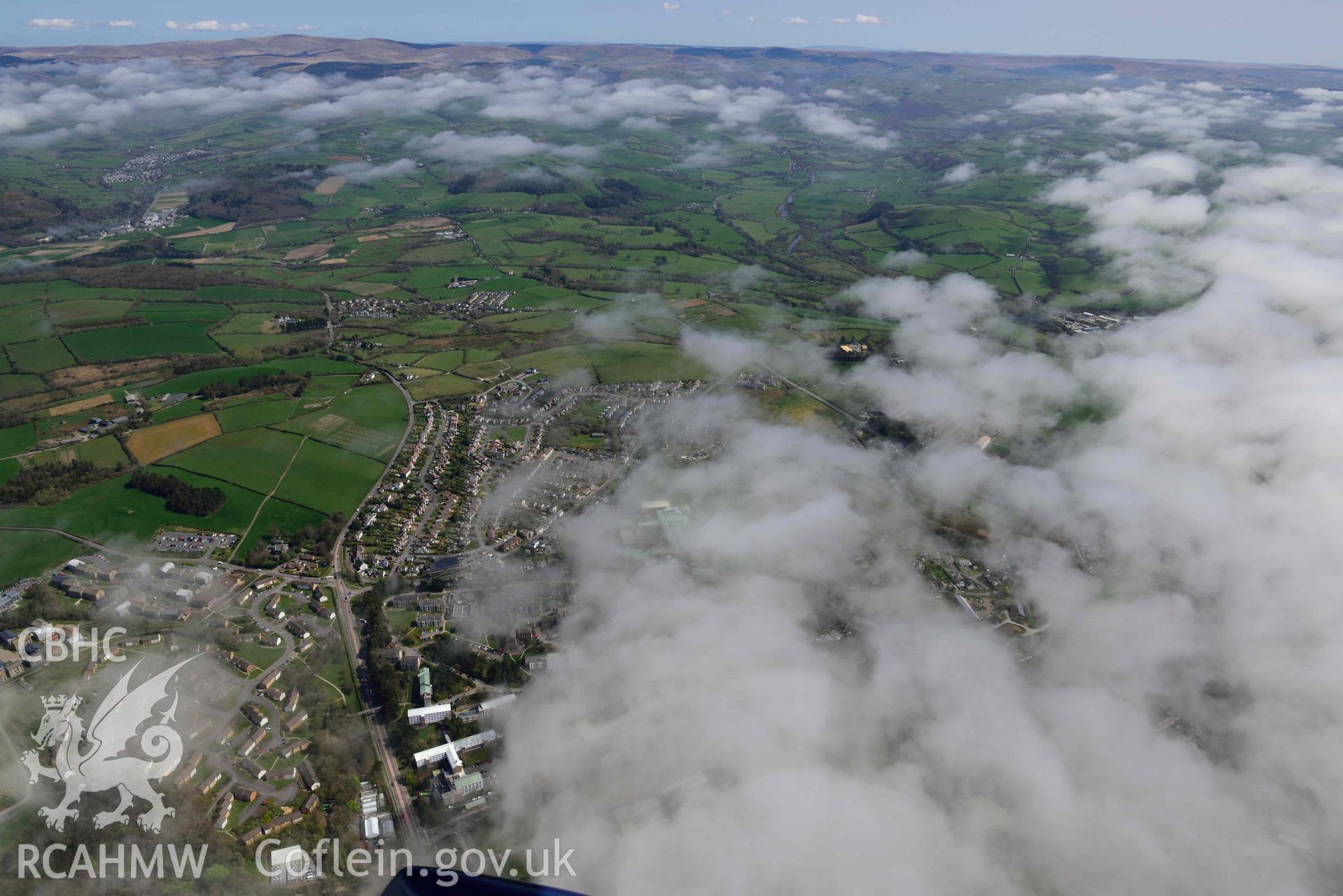 Aberystwyth University, with sea fog. Oblique aerial photograph taken during the Royal Commission’s programme of archaeological aerial reconnaissance by Toby Driver on 20 April 2018.