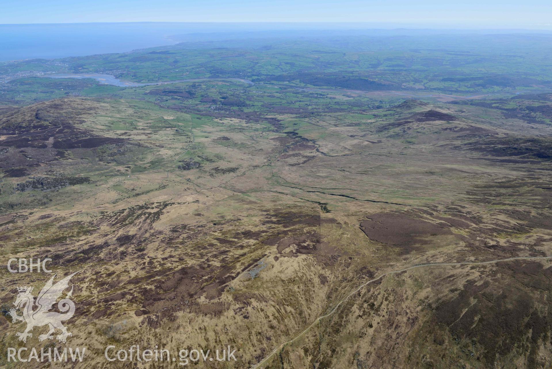 Carnedd-y-Ddelw, panoramic view looking east to Dyffryn Conwy. Oblique aerial photograph taken during the Royal Commission’s programme of archaeological aerial reconnaissance by Toby Driver on 20 April 2018.